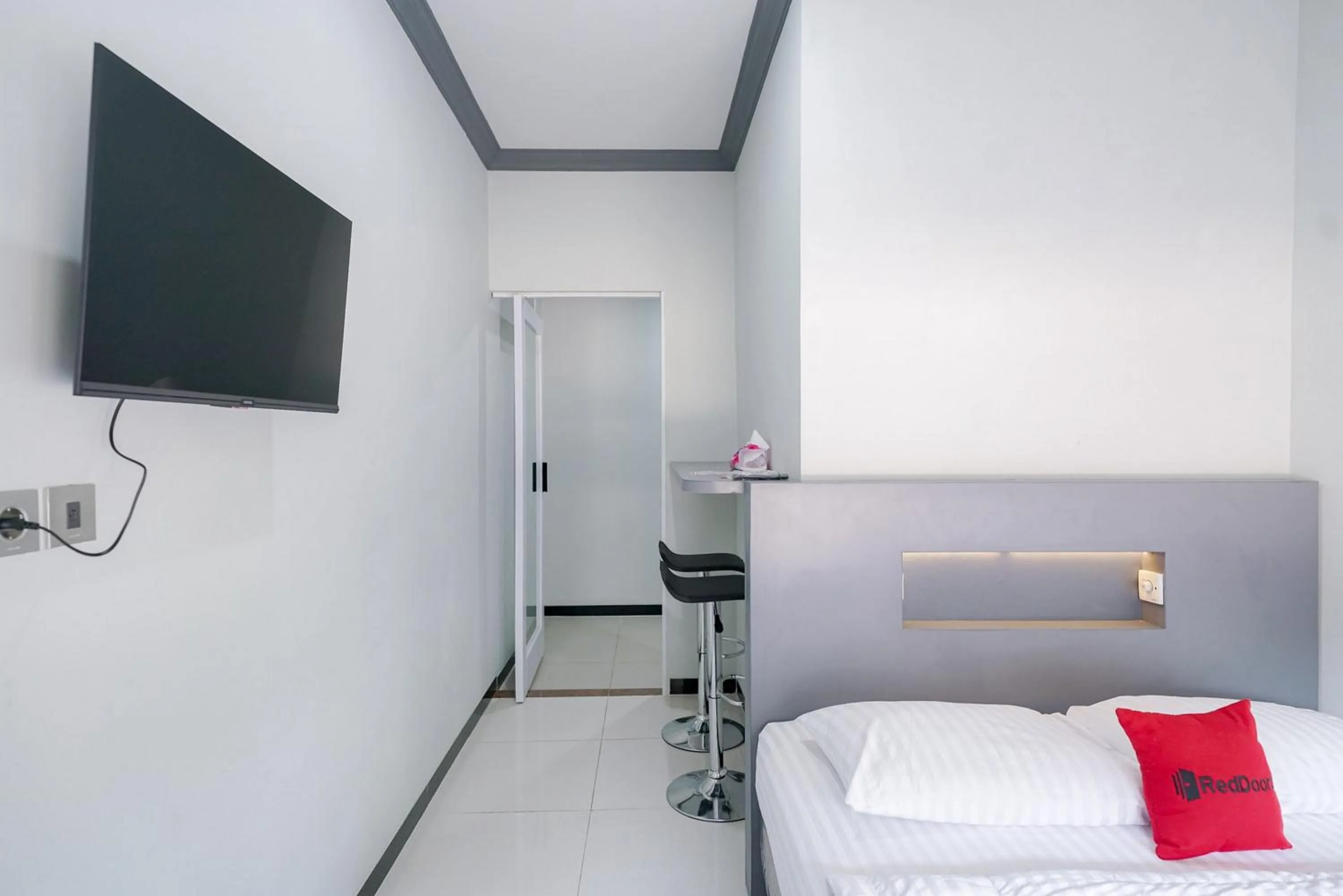 Bed in RedDoorz Syariah At Jalan Endro Suratmin Lampung