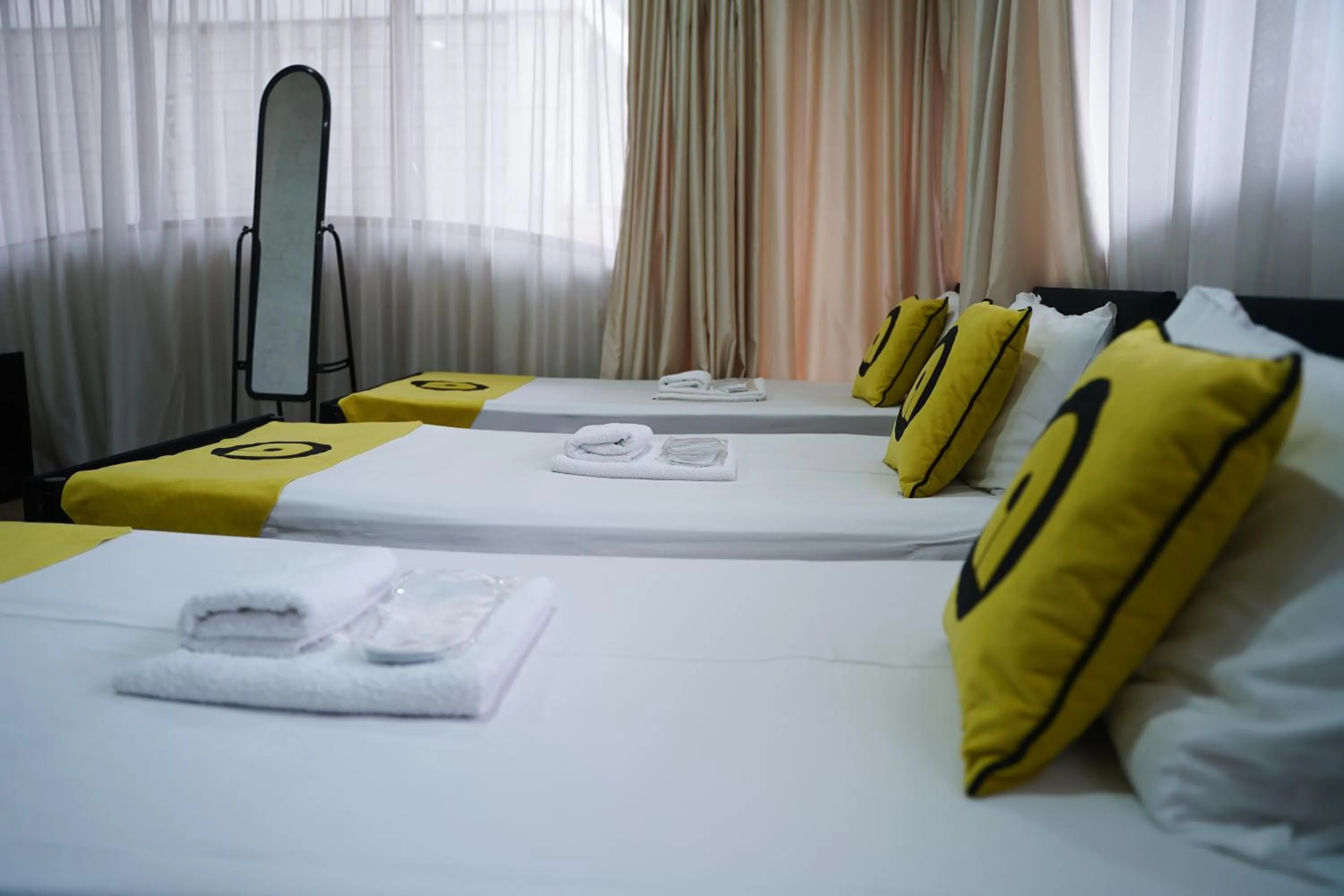 Bed in Hotel Aira Plaza