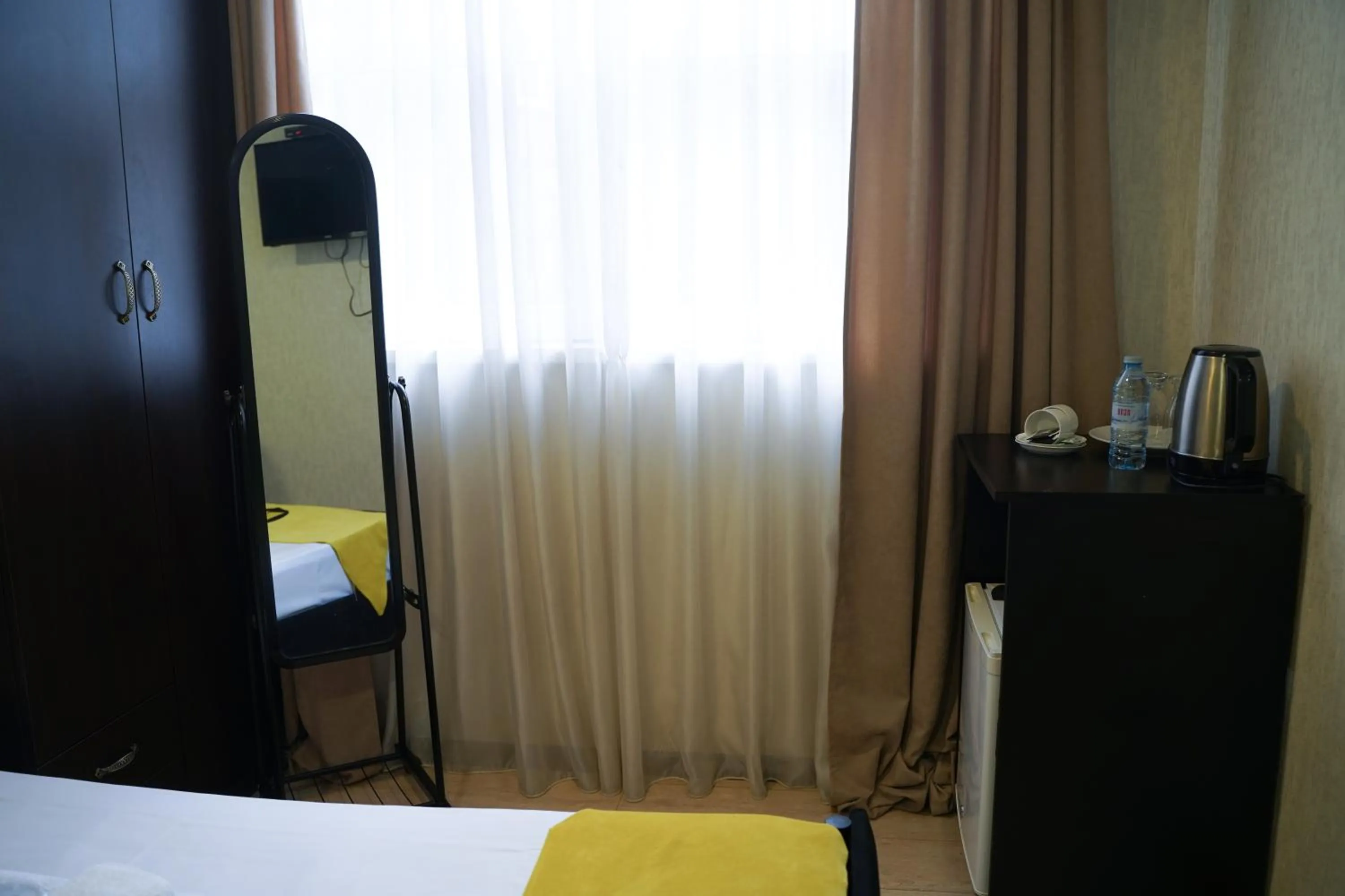 Bed in Hotel Aira Plaza