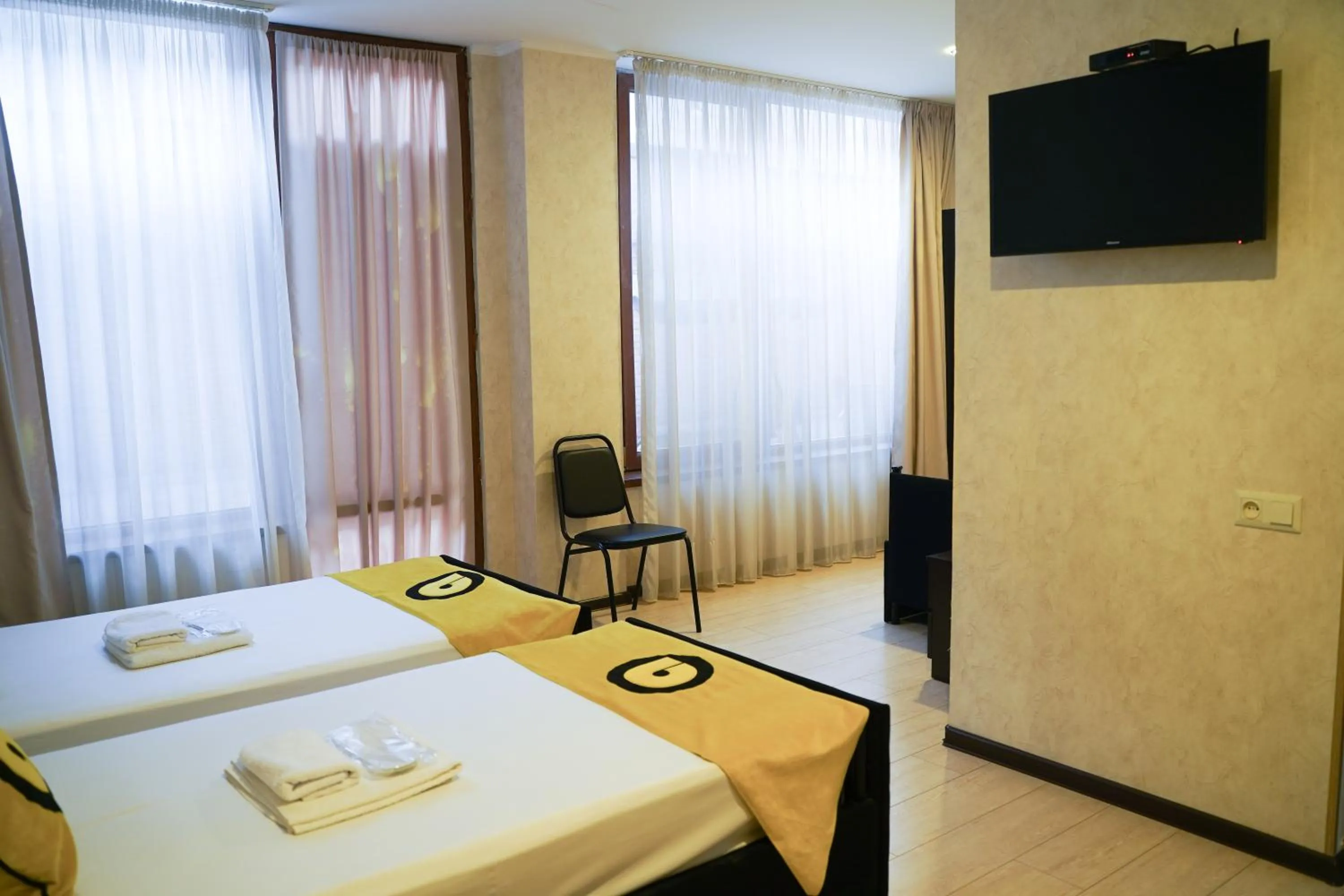 Bed in Hotel Aira Plaza