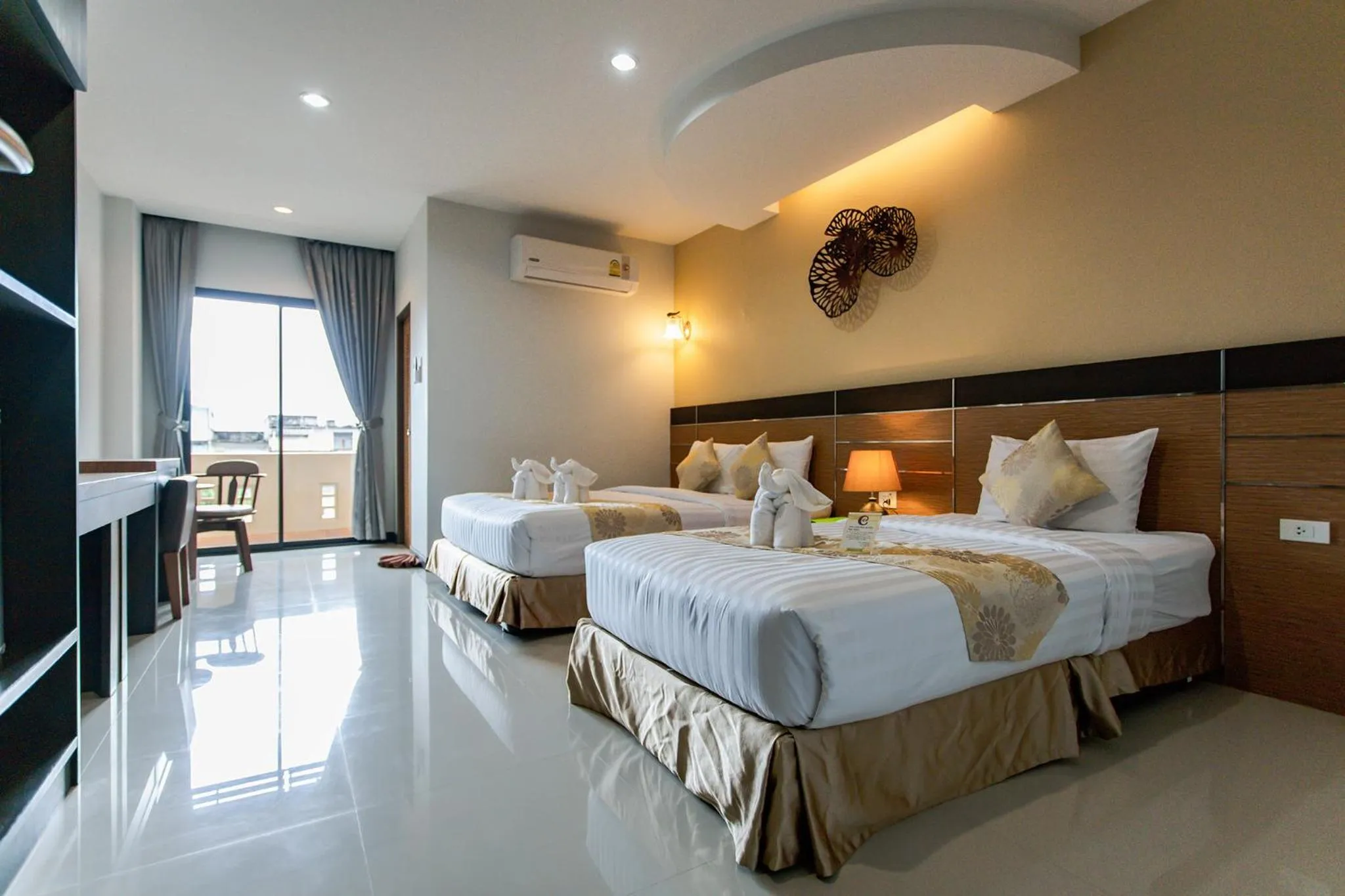 Bed in The Centris Hotel Phatthalung