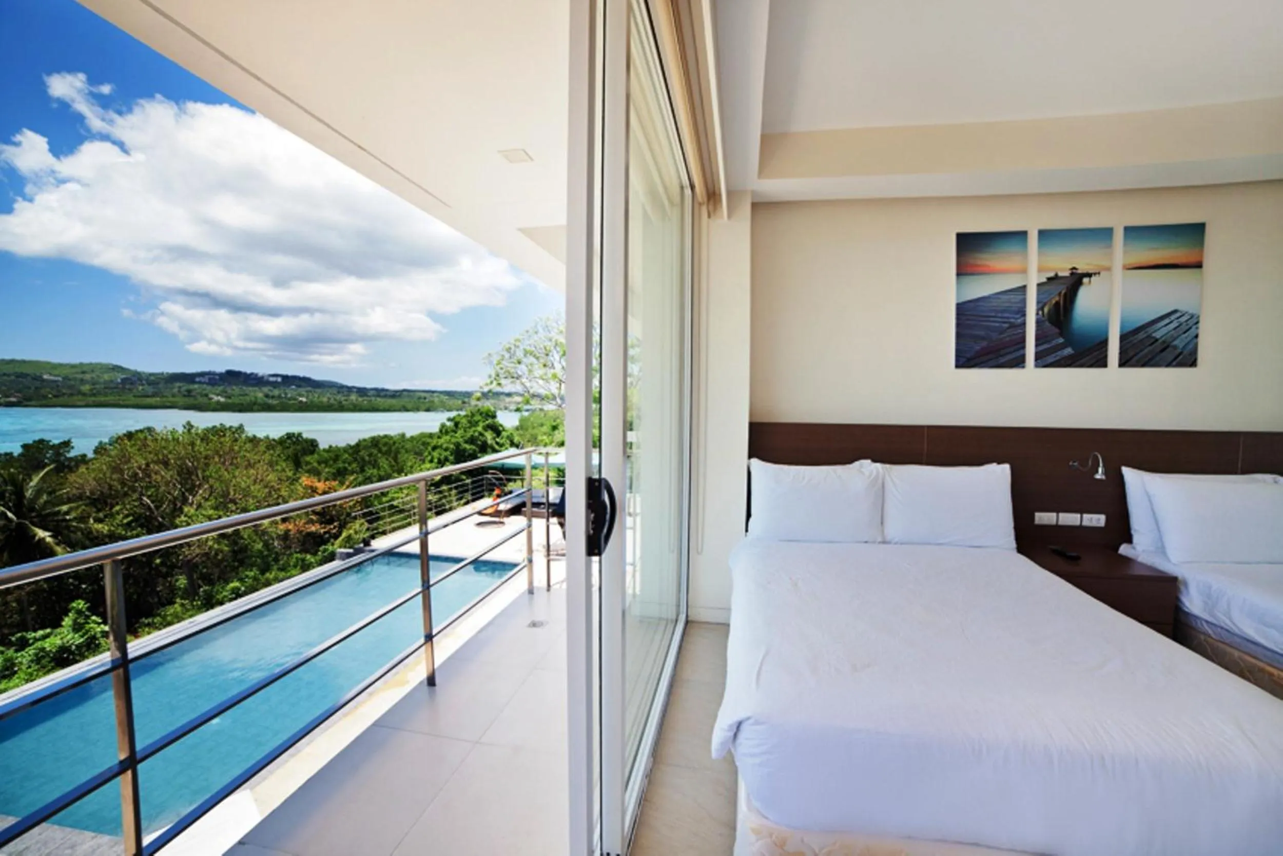 Decorative detail, Bed in Ocean Suites Bohol Boutique Hotel