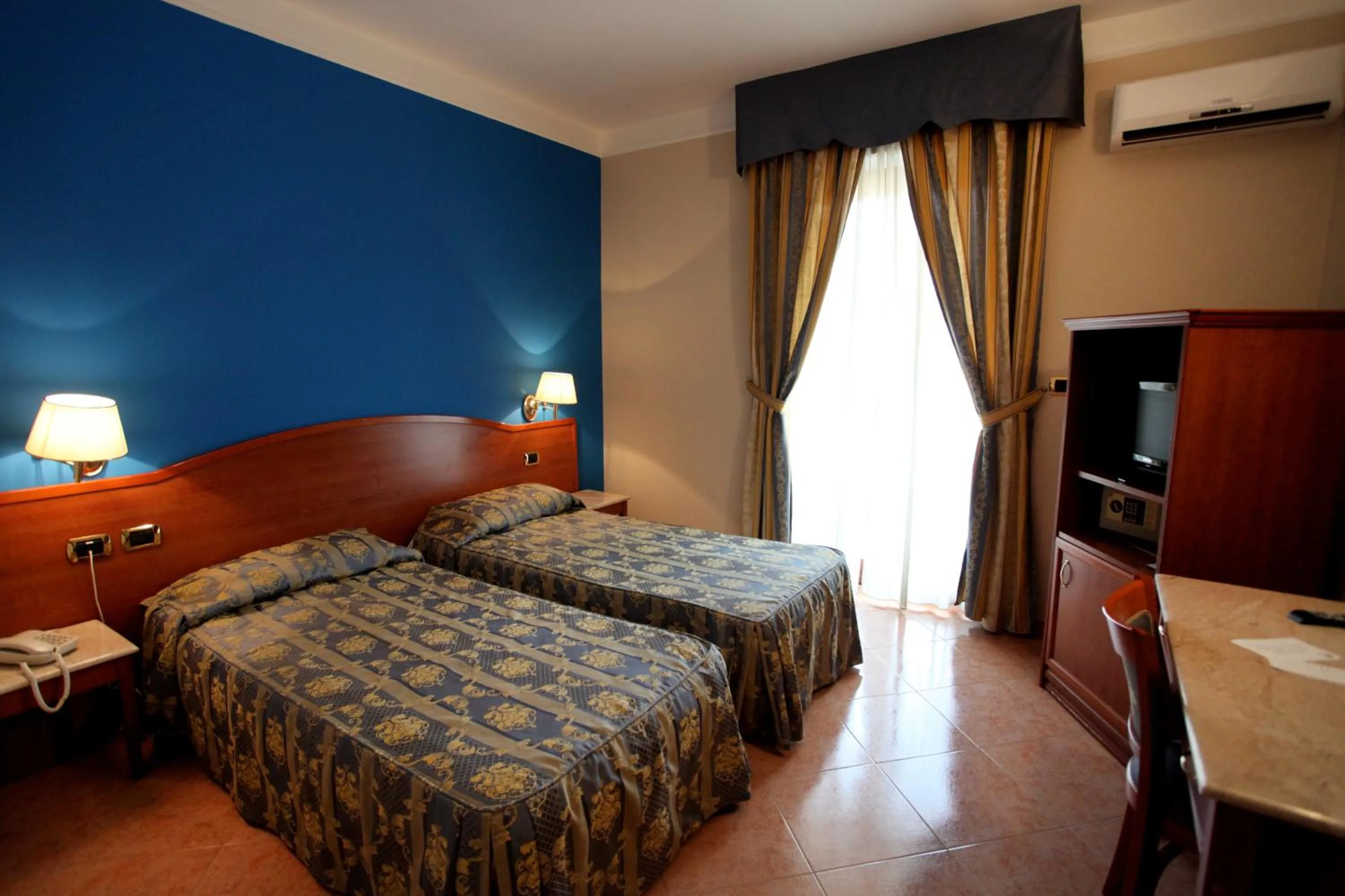 Bed in Belsito Hotel