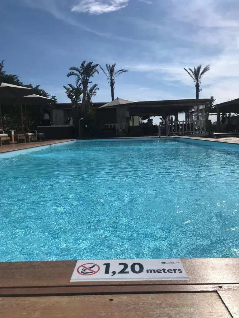 Swimming pool in Cumeja Beach Club & Hotel Swimming pool in Cumeja Beach Club & Hotel