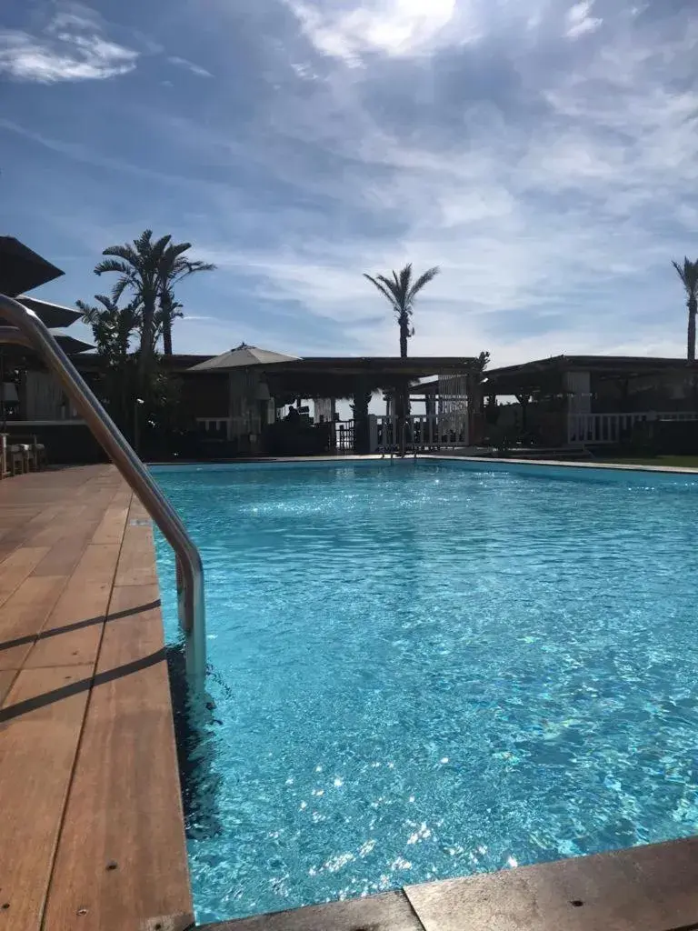 Swimming pool in Cumeja Beach Club & Hotel Swimming pool in Cumeja Beach Club & Hotel