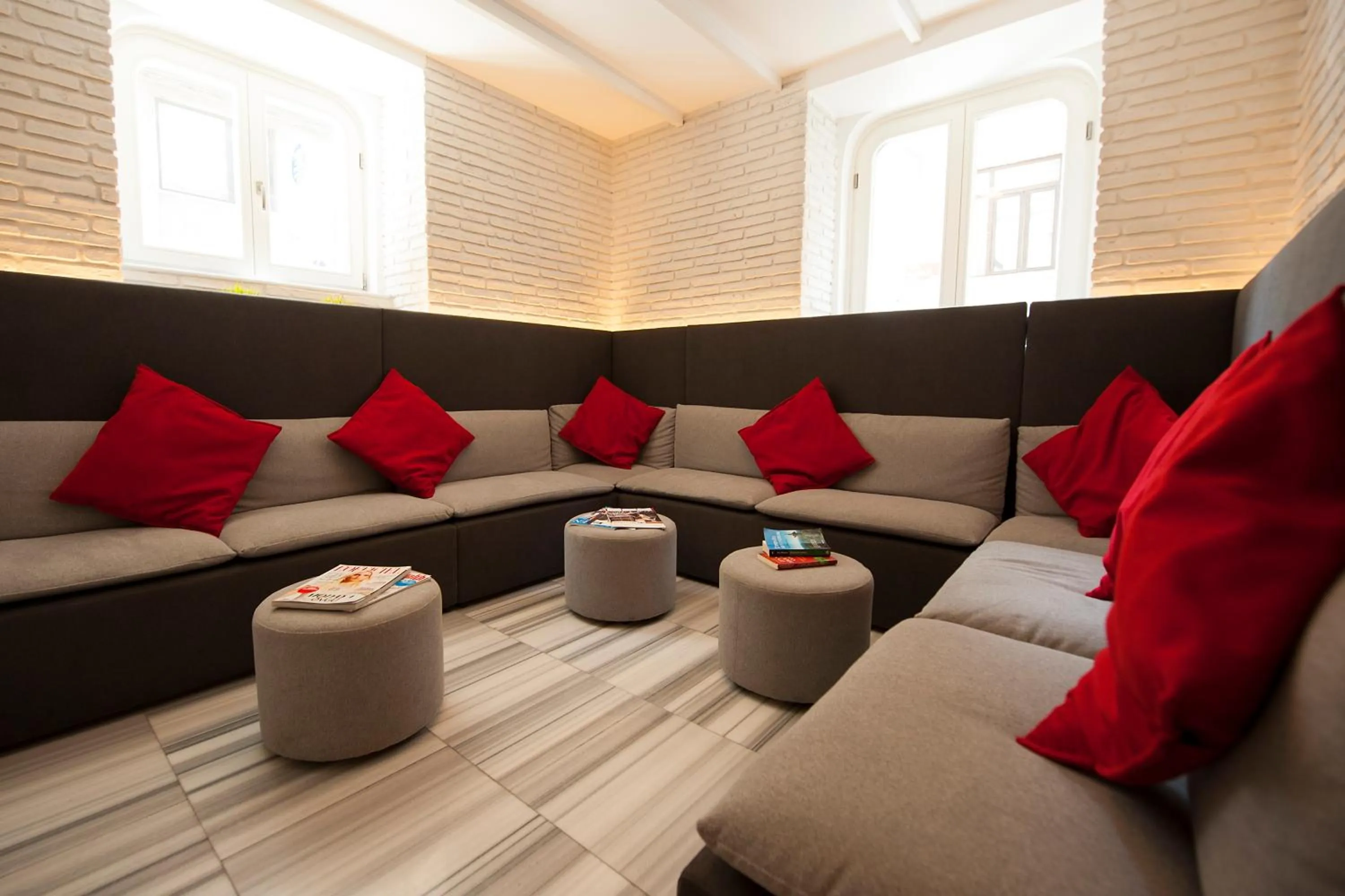 Communal lounge/ TV room in Wabi Hostels