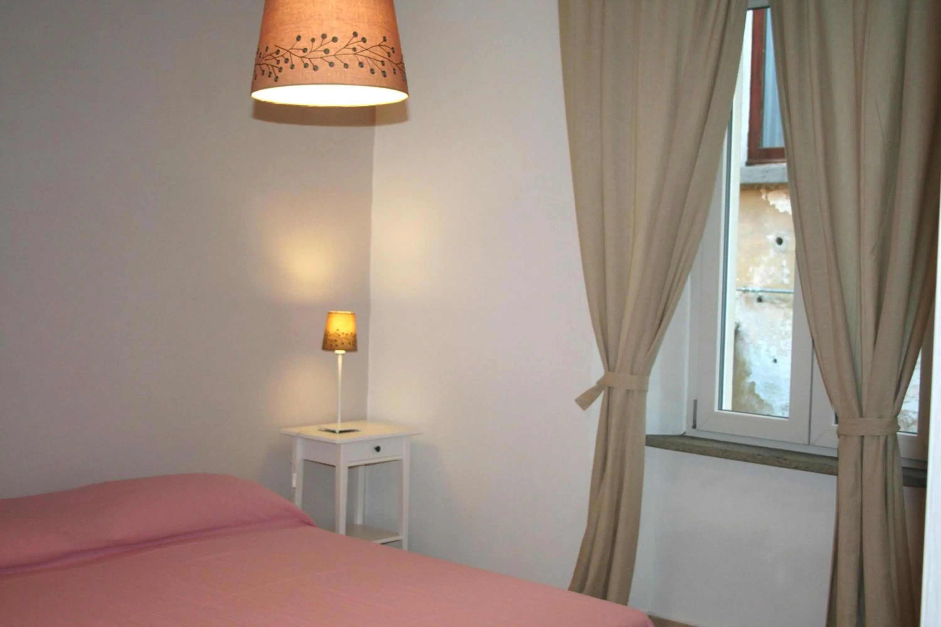 Photo of the whole room, Bed in Appartamenti Urbevetus