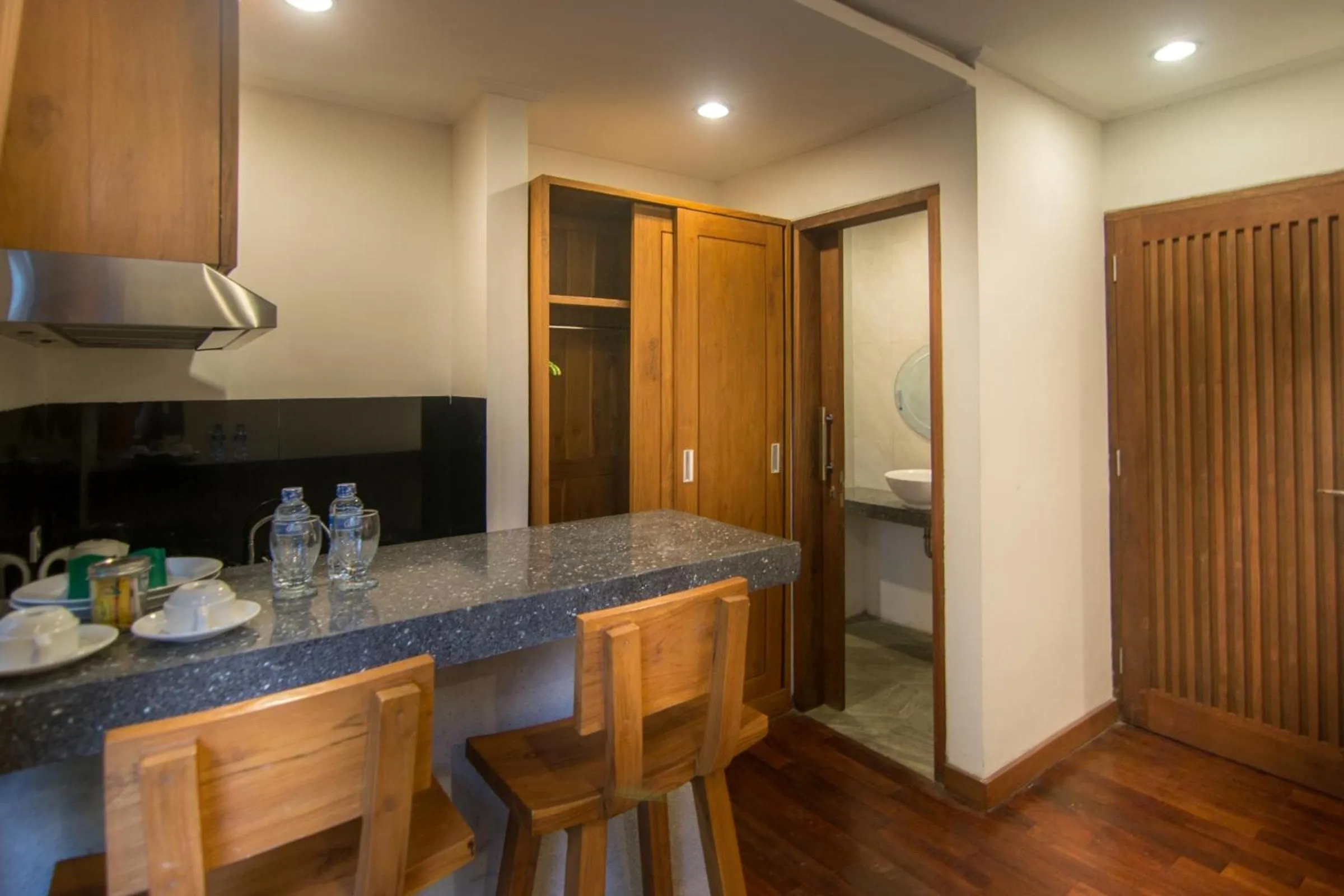 Kitchen or kitchenette in Delu Villas & Suite