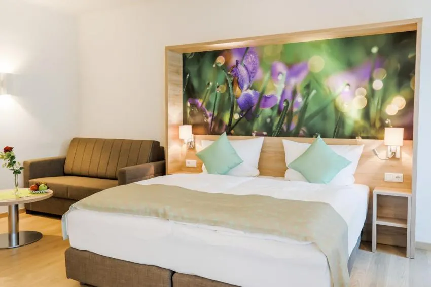 Bed in R&R Residenzen HOTEL