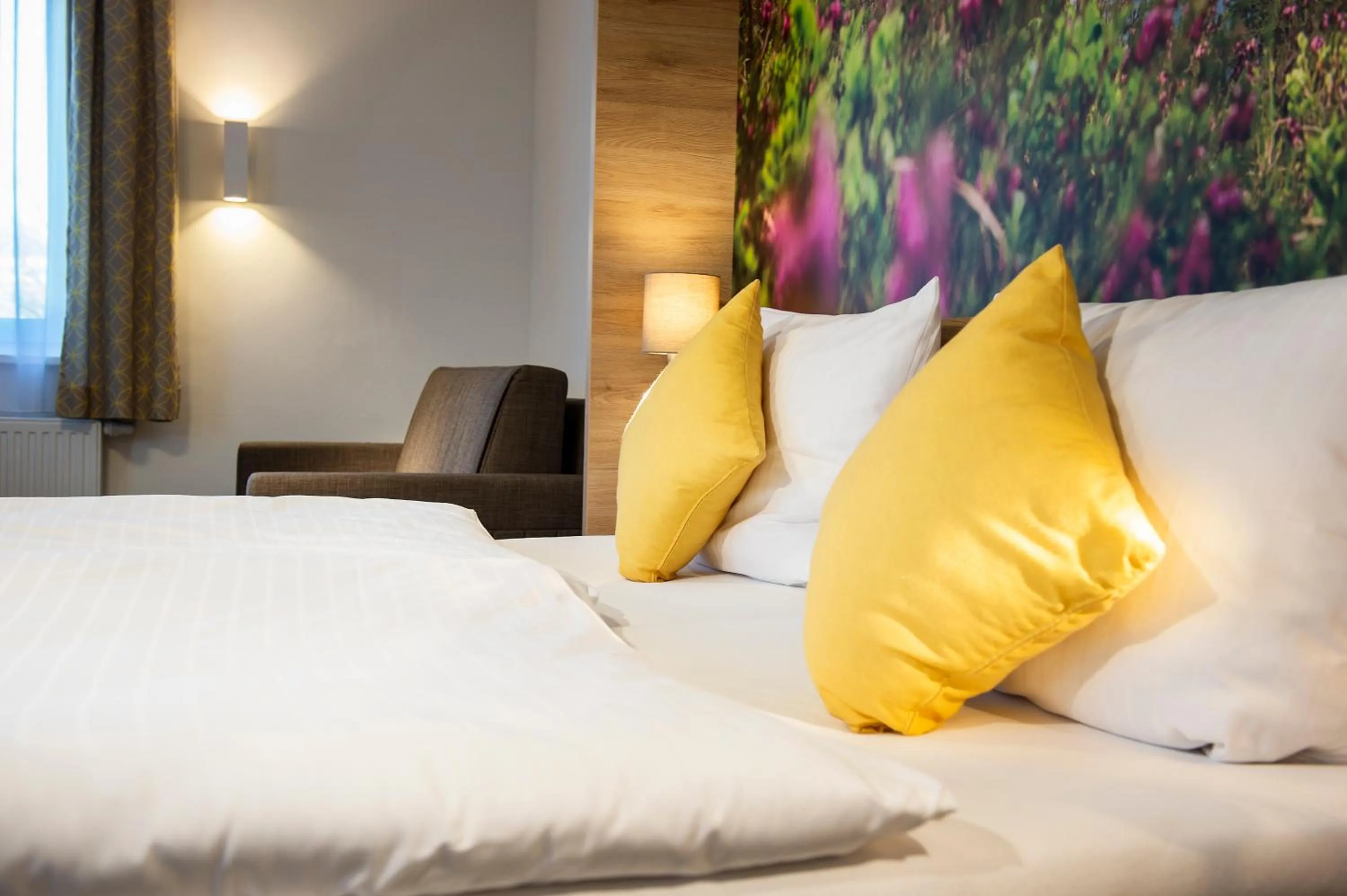 Bed in R&R Residenzen HOTEL