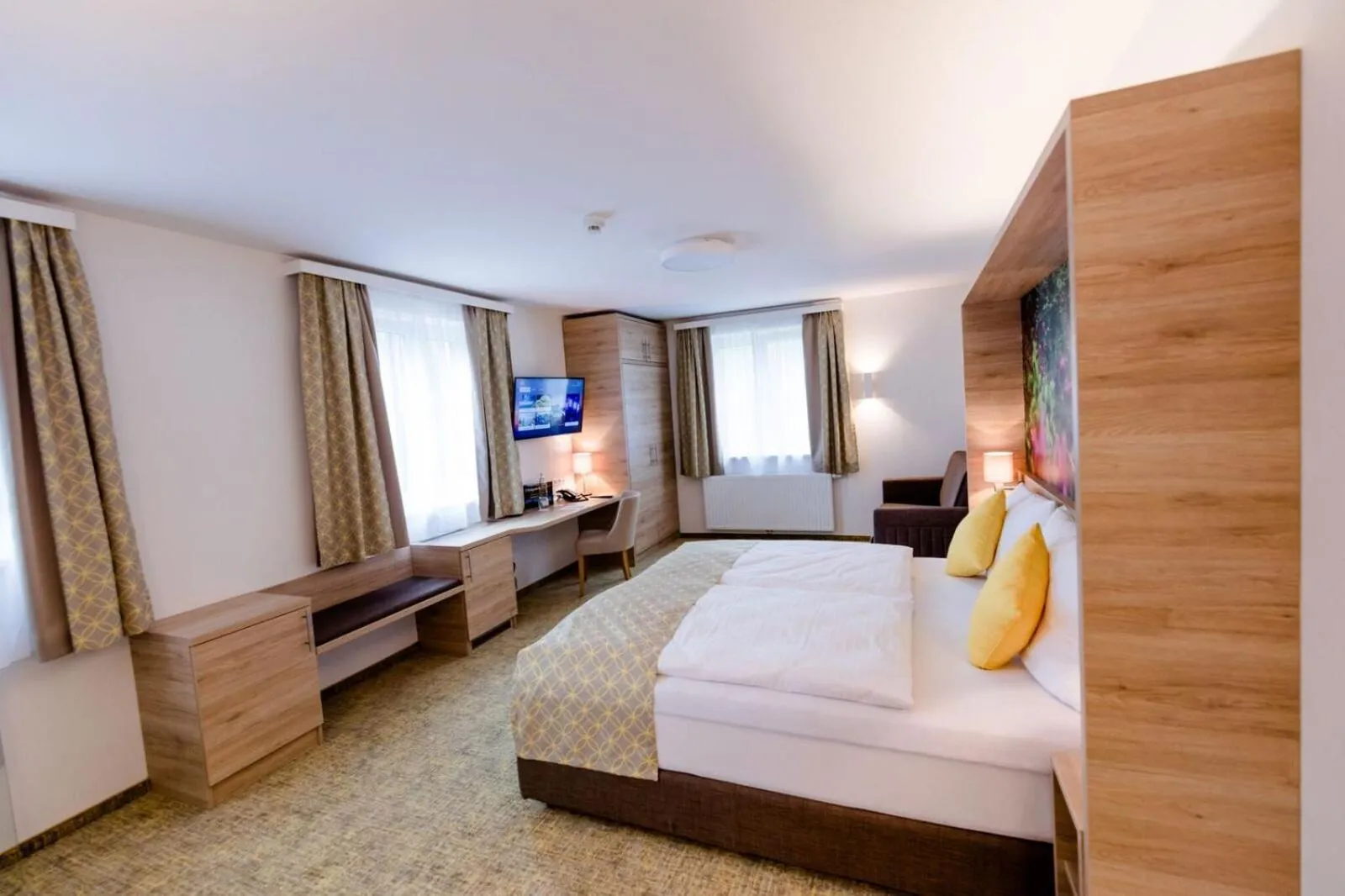 Bed in R&R Residenzen HOTEL