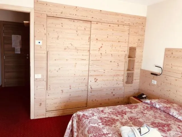 Bed in Hotel Paradiso