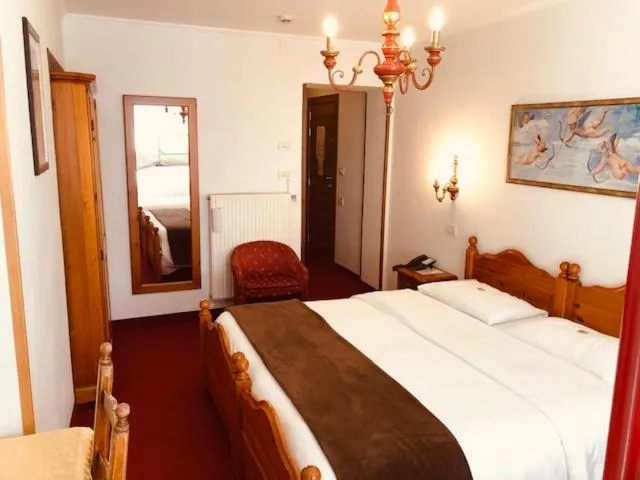 Bed in Hotel Paradiso