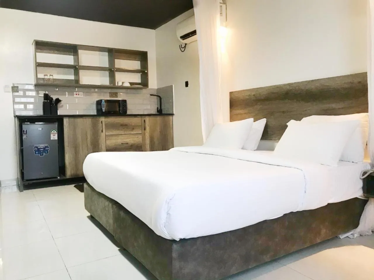 Bed in The Ivory Suites