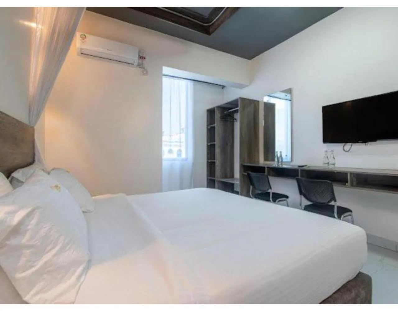 Bed in The Ivory Suites