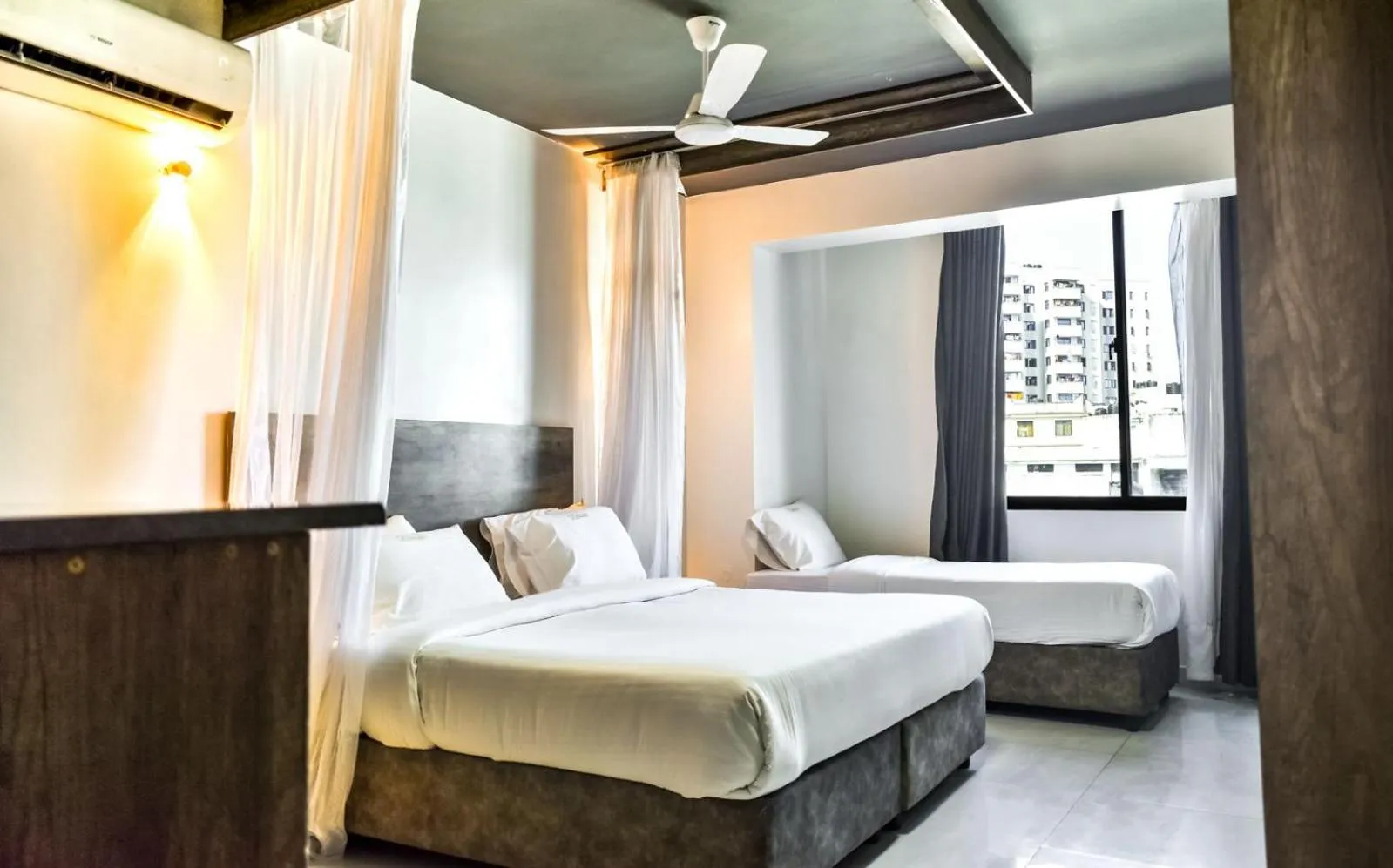 Bed in The Ivory Suites