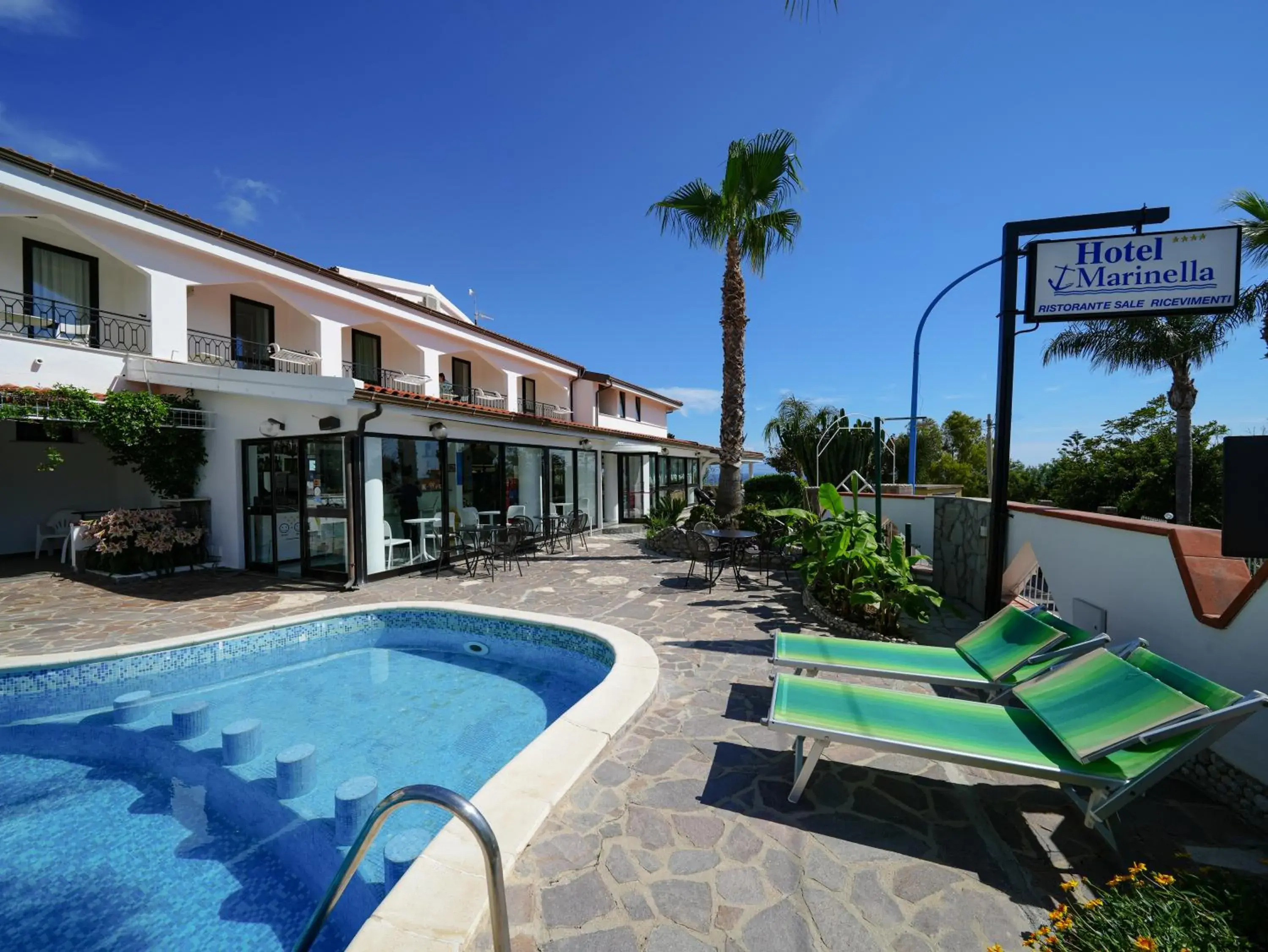 Swimming pool in Hotel MARINELLA parking wi-fi spiaggia attrezzata Swimming pool in Hotel MARINELLA parking wi-fi spiaggia attrezzata