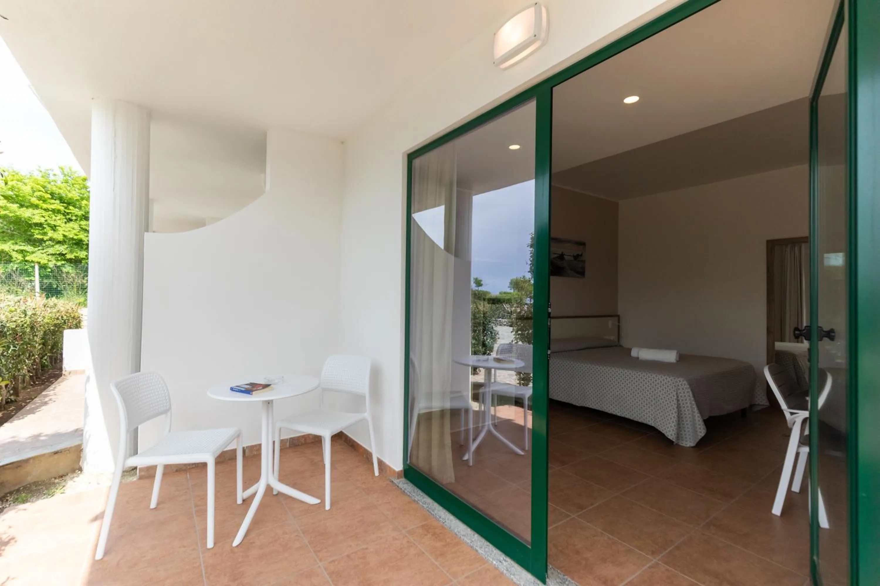 Balcony/Terrace, Bed in Hotel MARINELLA parking wi-fi spiaggia attrezzata