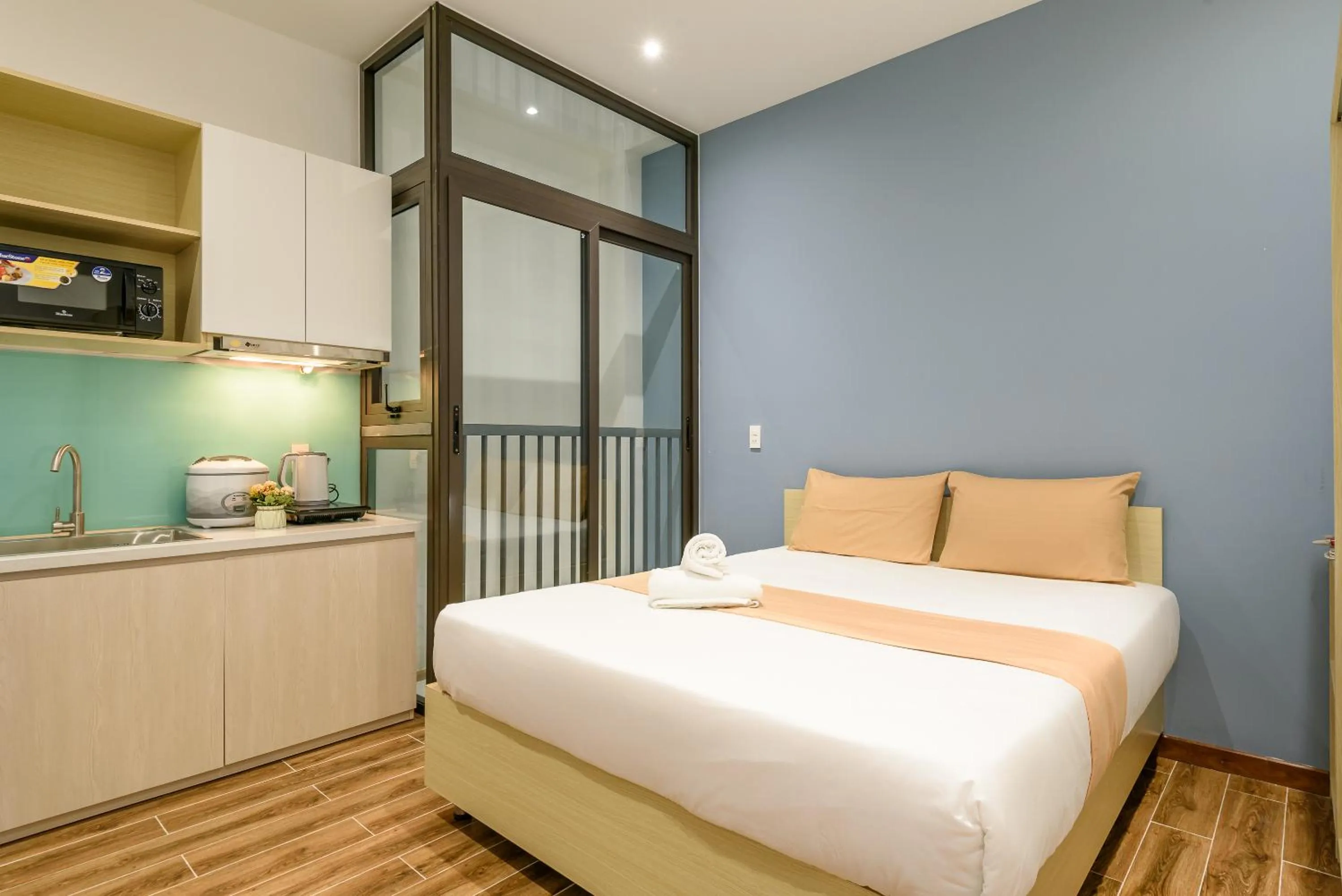 Photo of the whole room, Bed in Cozrum Homes - June Corner