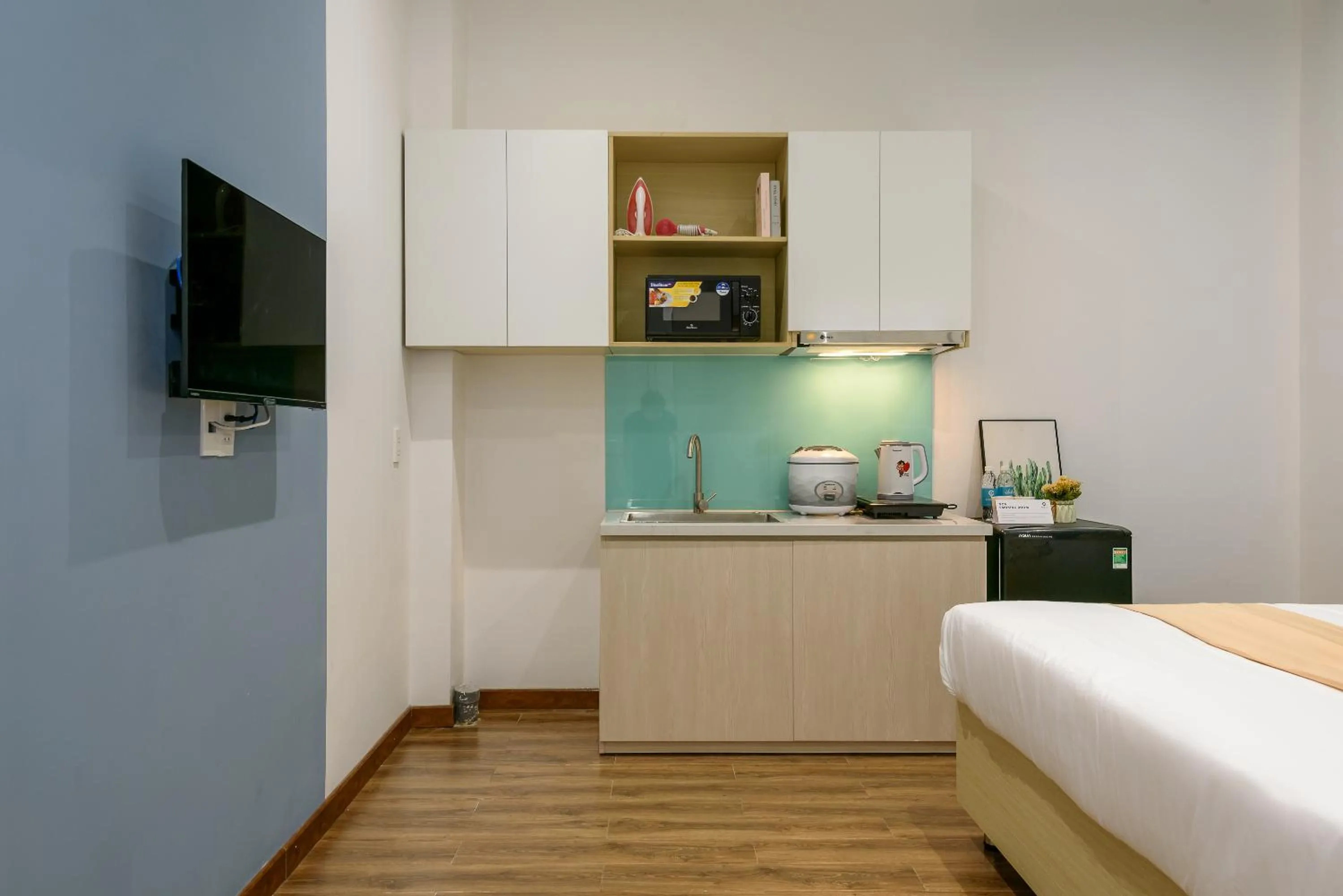 Kitchen or kitchenette, Bed in Cozrum Homes - June Corner