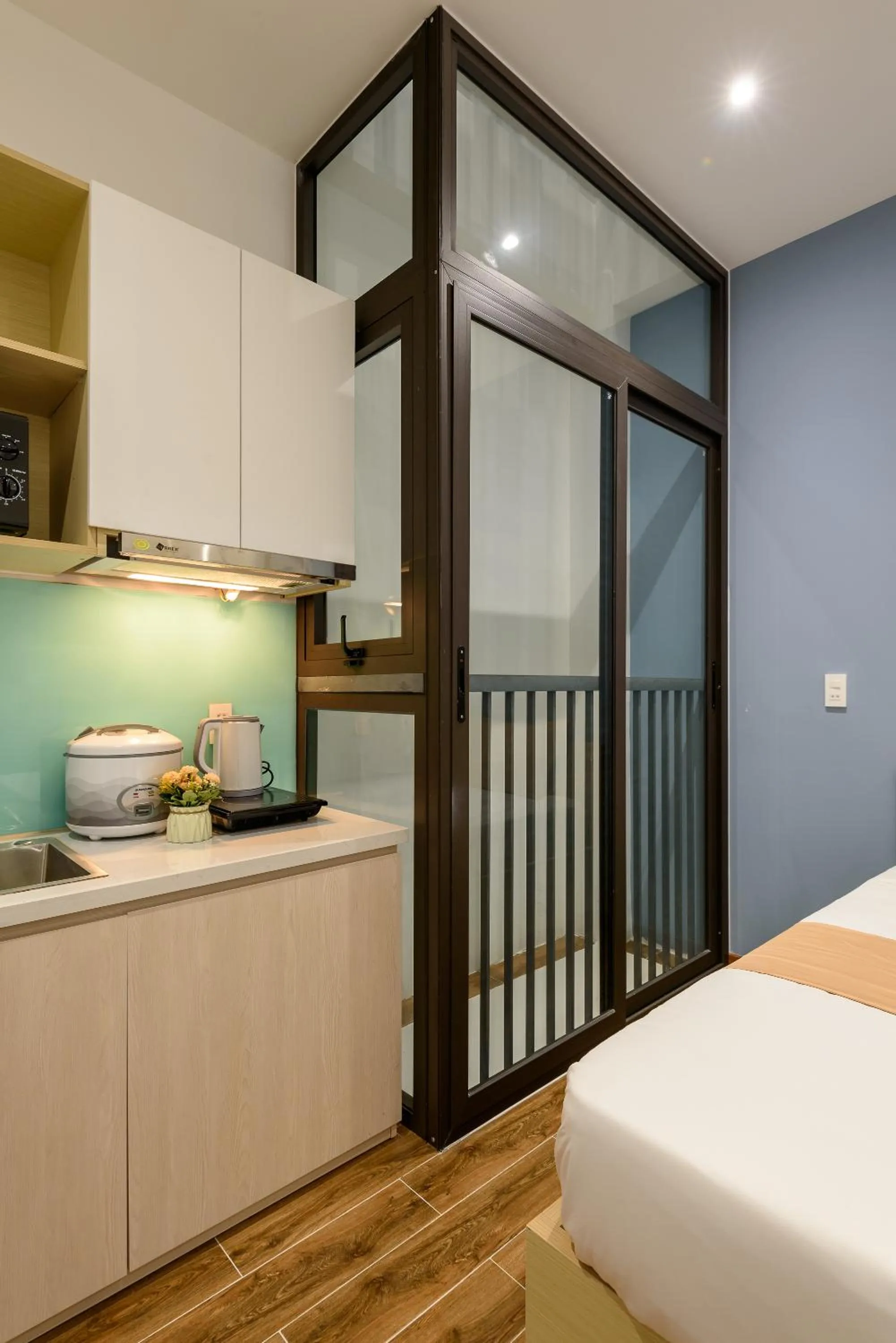 Kitchen or kitchenette, Bed in Cozrum Homes - June Corner