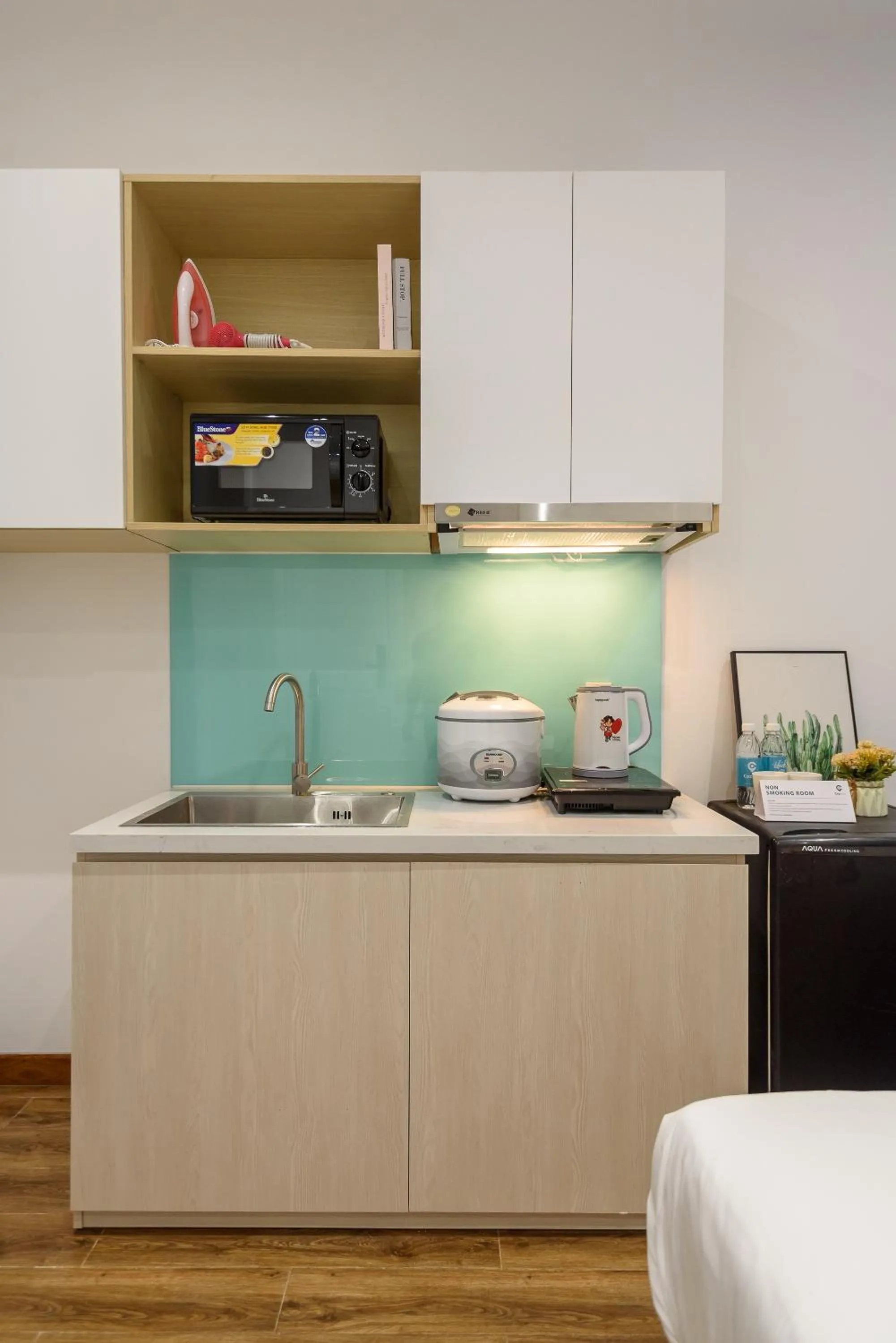 Kitchen or kitchenette in Cozrum Homes - June Corner