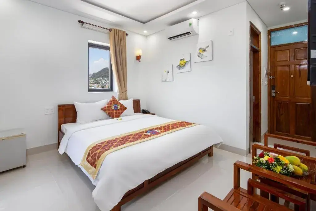 Bed in Khách sạn Phạm Gia Đà Nẵng (Phạm Gia Hotel) Bed in Khách sạn Phạm Gia Đà Nẵng (Phạm Gia Hotel)