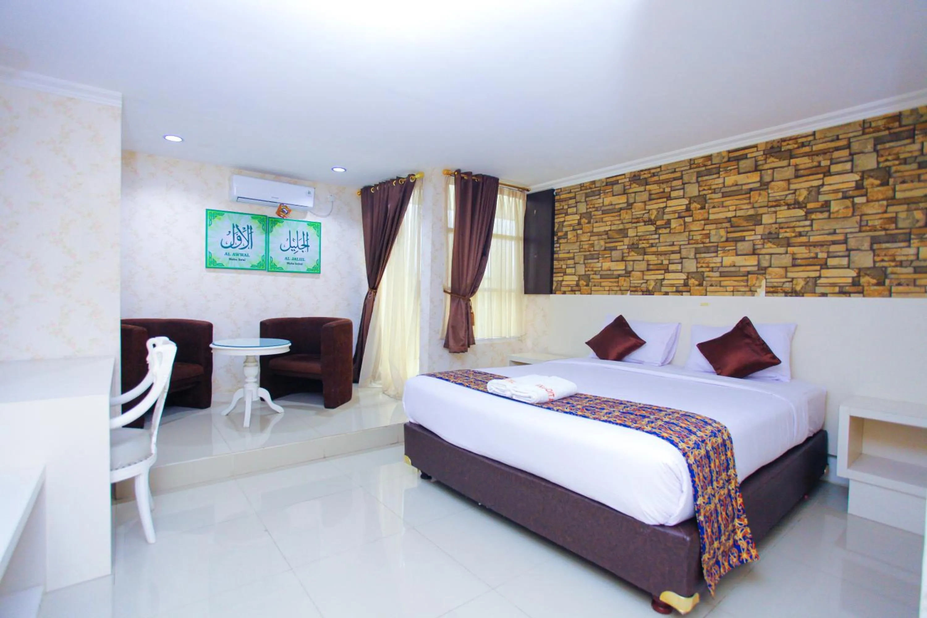 Bed in The Djakarta Anandita Syariah Hotel