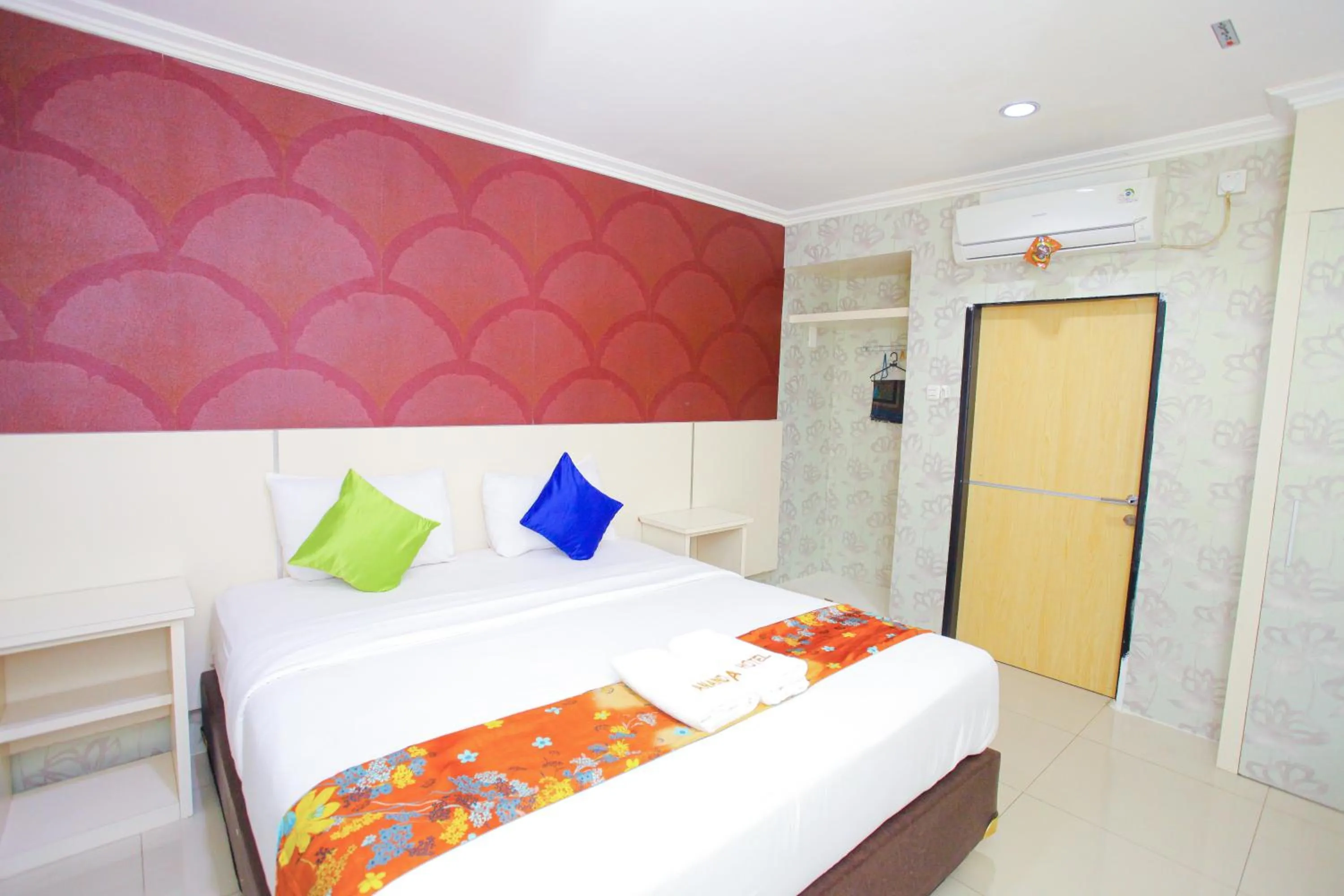 Bed in The Djakarta Anandita Syariah Hotel