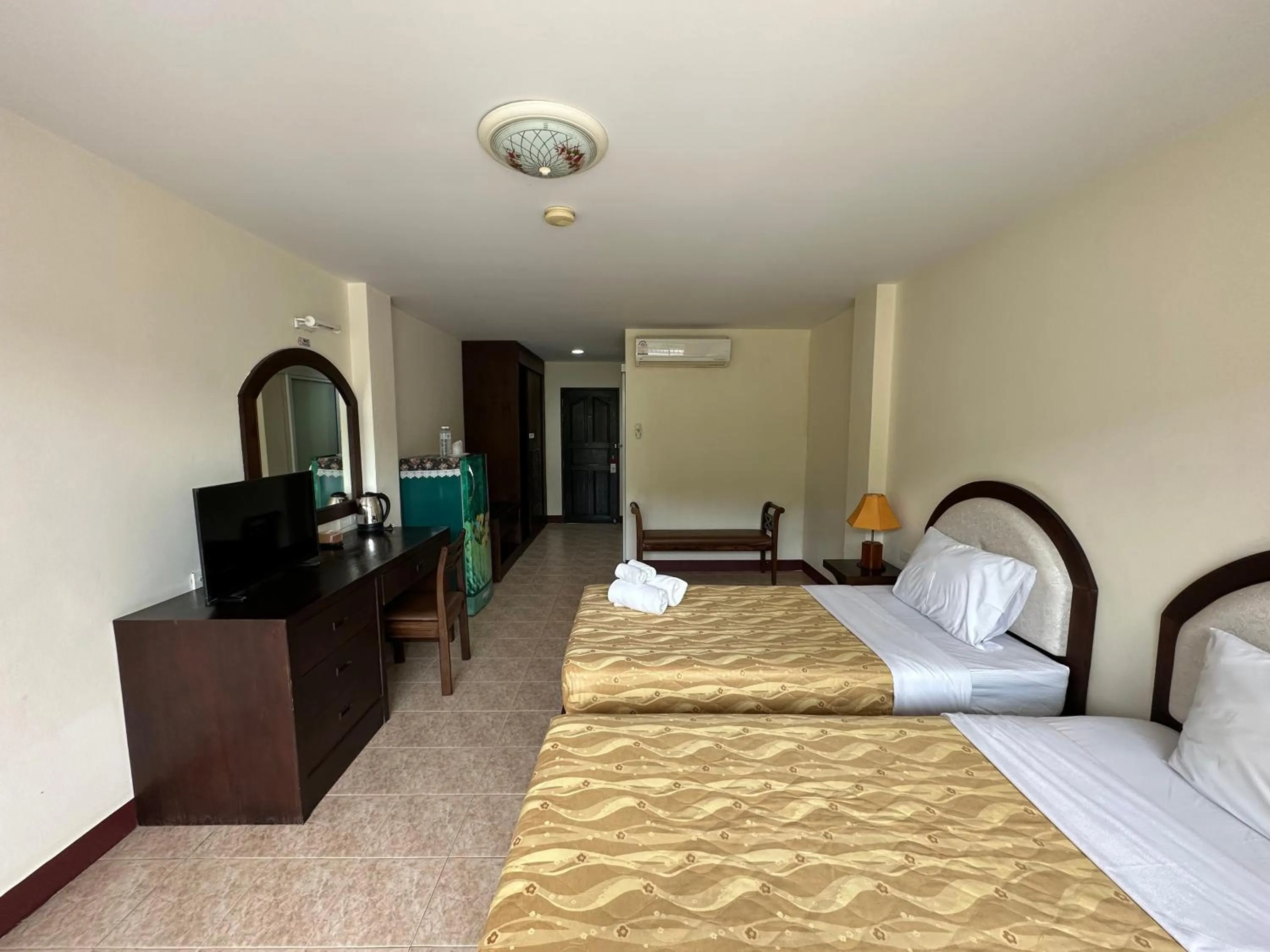 Bed in Kata Place Hotel