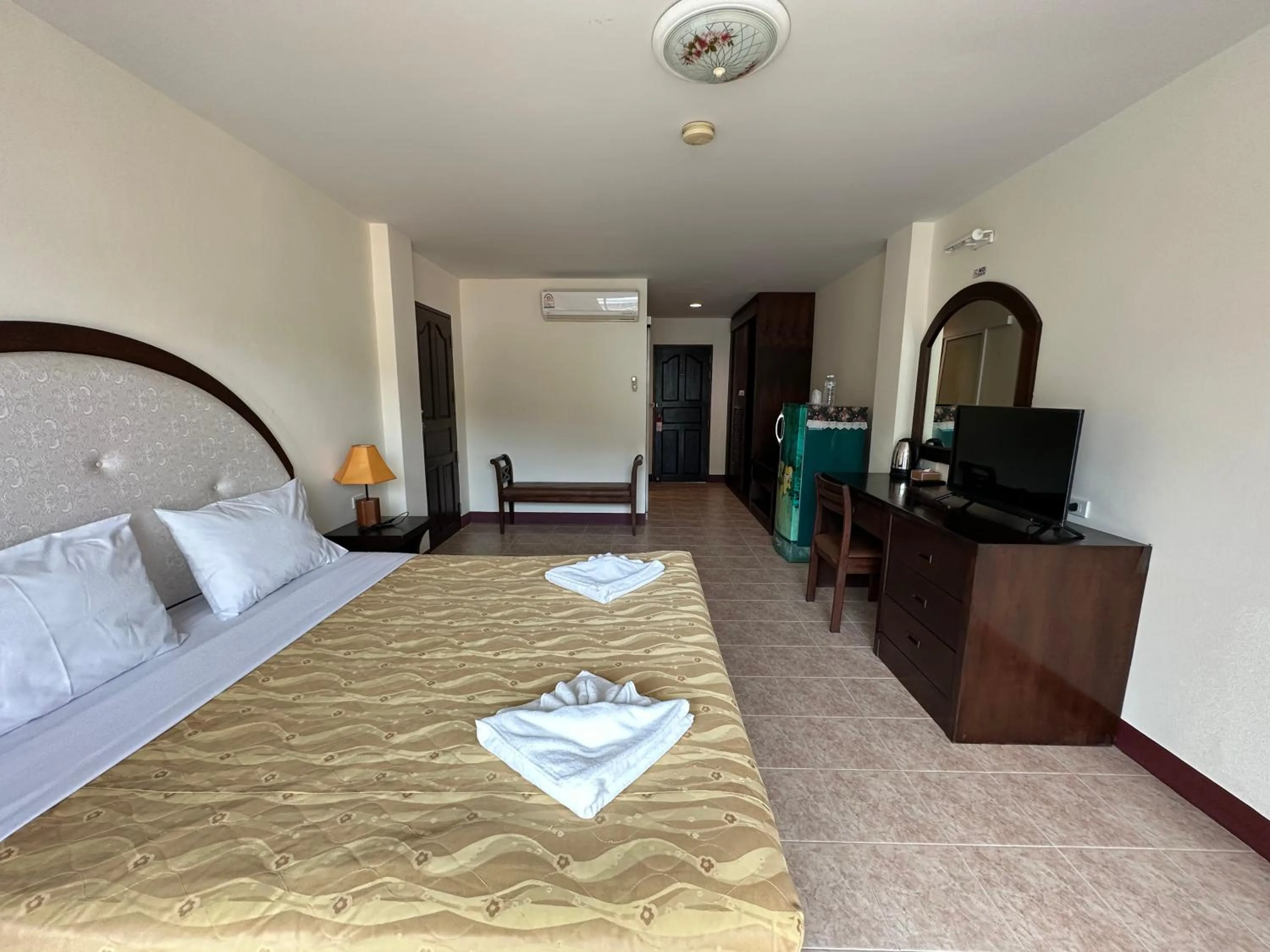 Bed in Kata Place Hotel