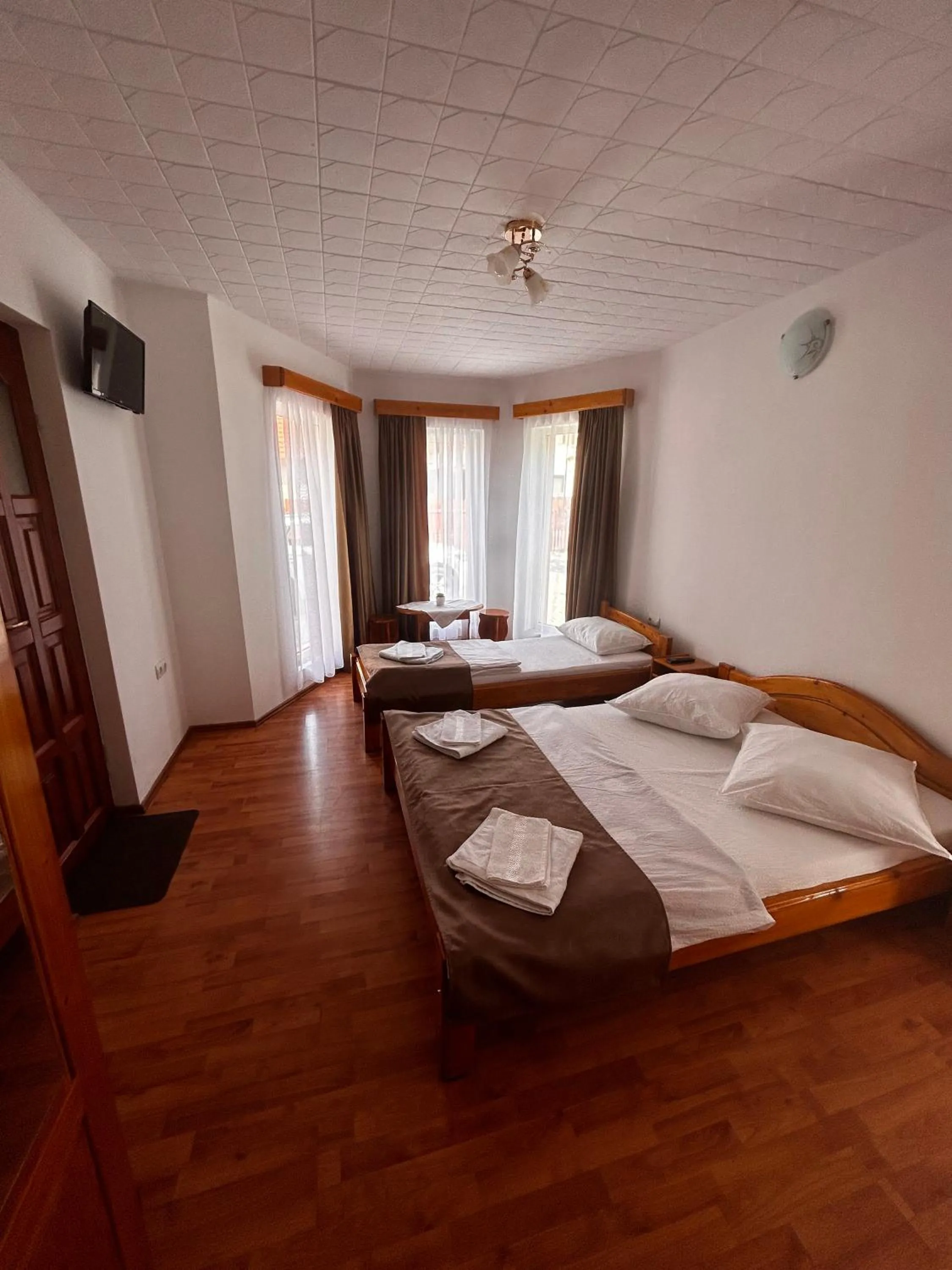 Bed in PENSIUNEA KELEMEN