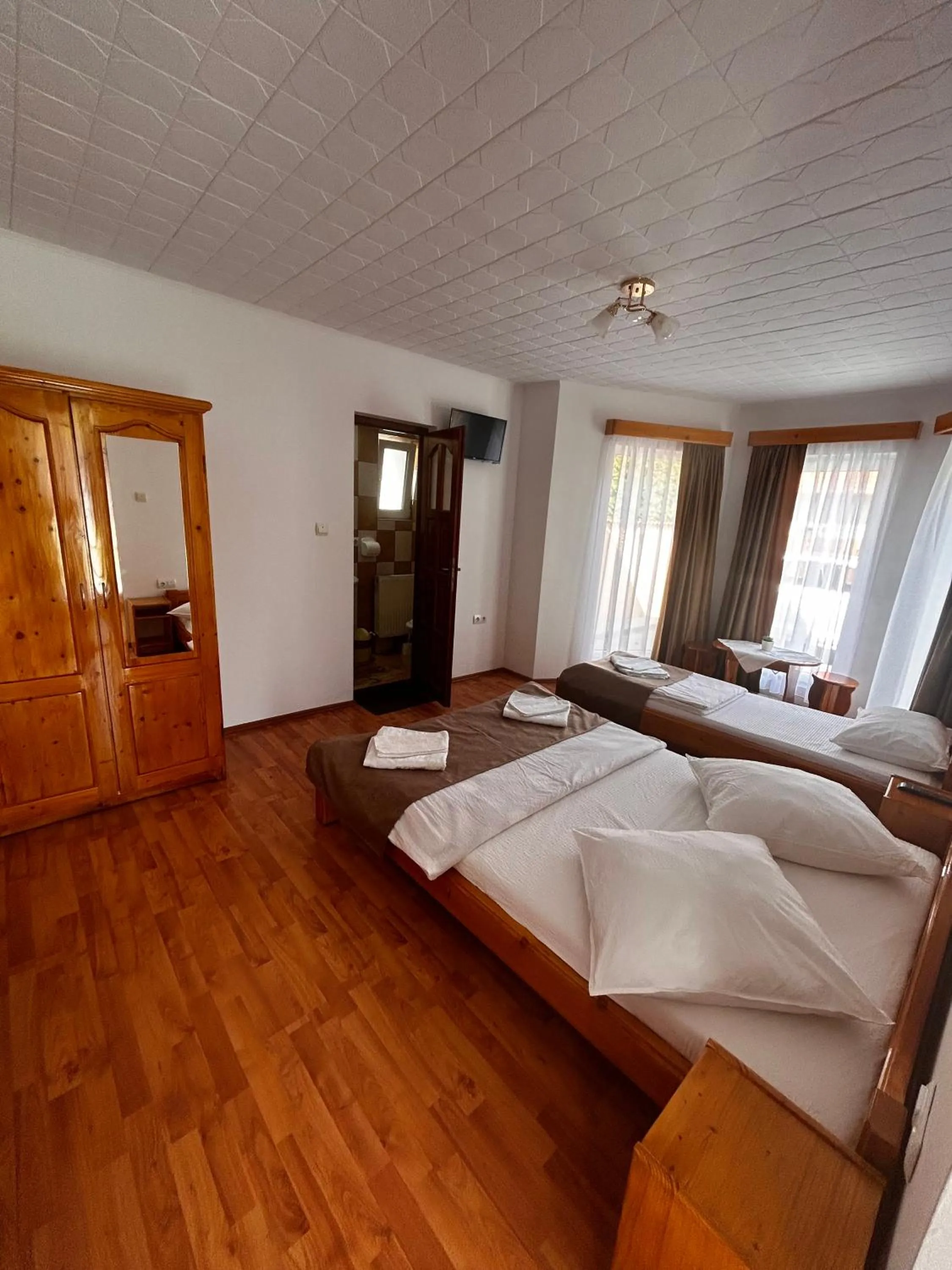 Bed in PENSIUNEA KELEMEN