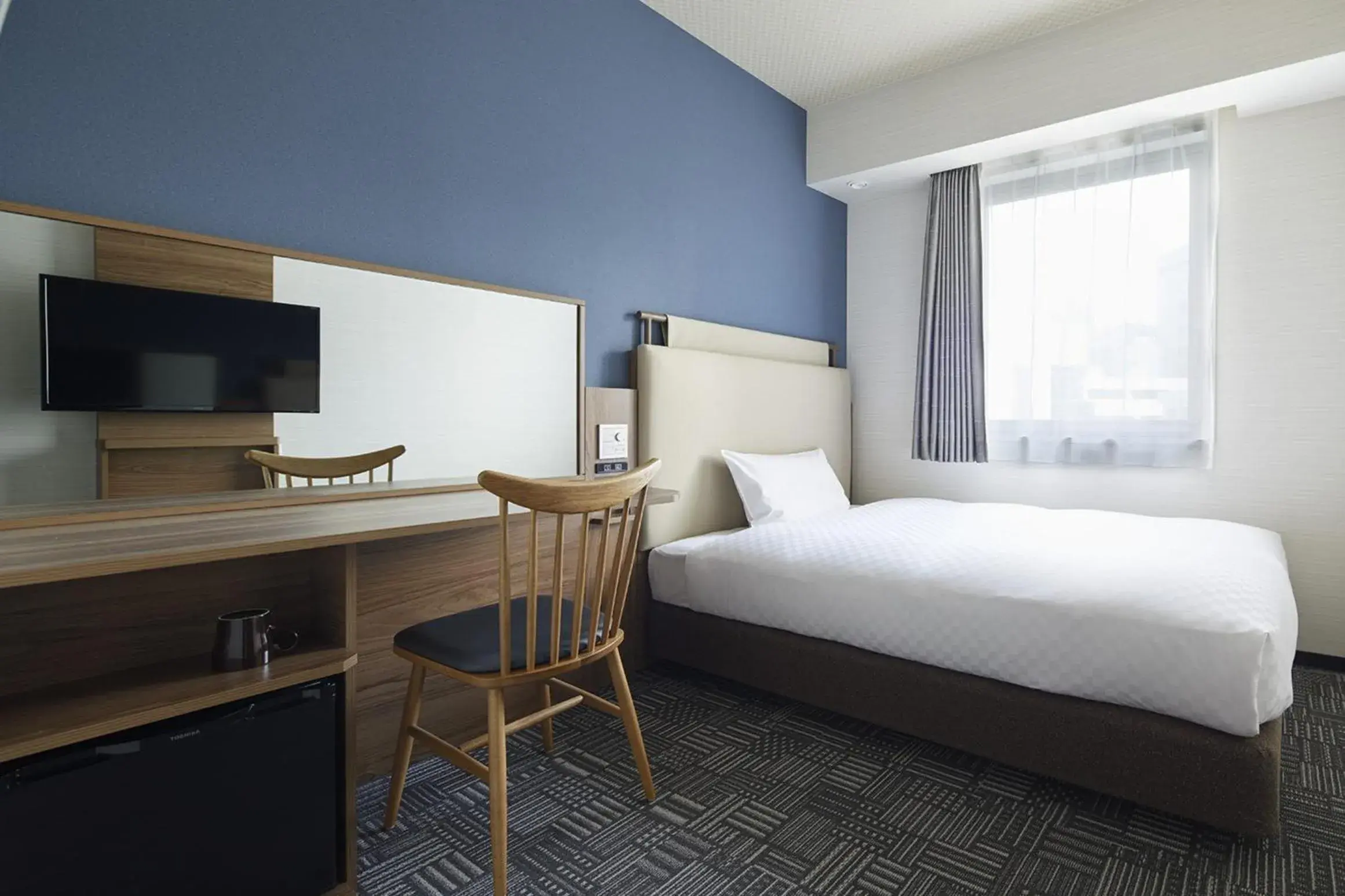 Bed in Via Inn Hakataguchi Ekimae Bed in Via Inn Hakataguchi Ekimae