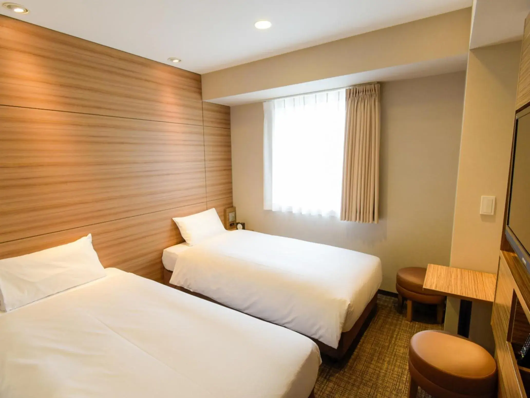 Bed in Via Inn Nagoya Shinkansen-guchi Bed in Via Inn Nagoya Shinkansen-guchi