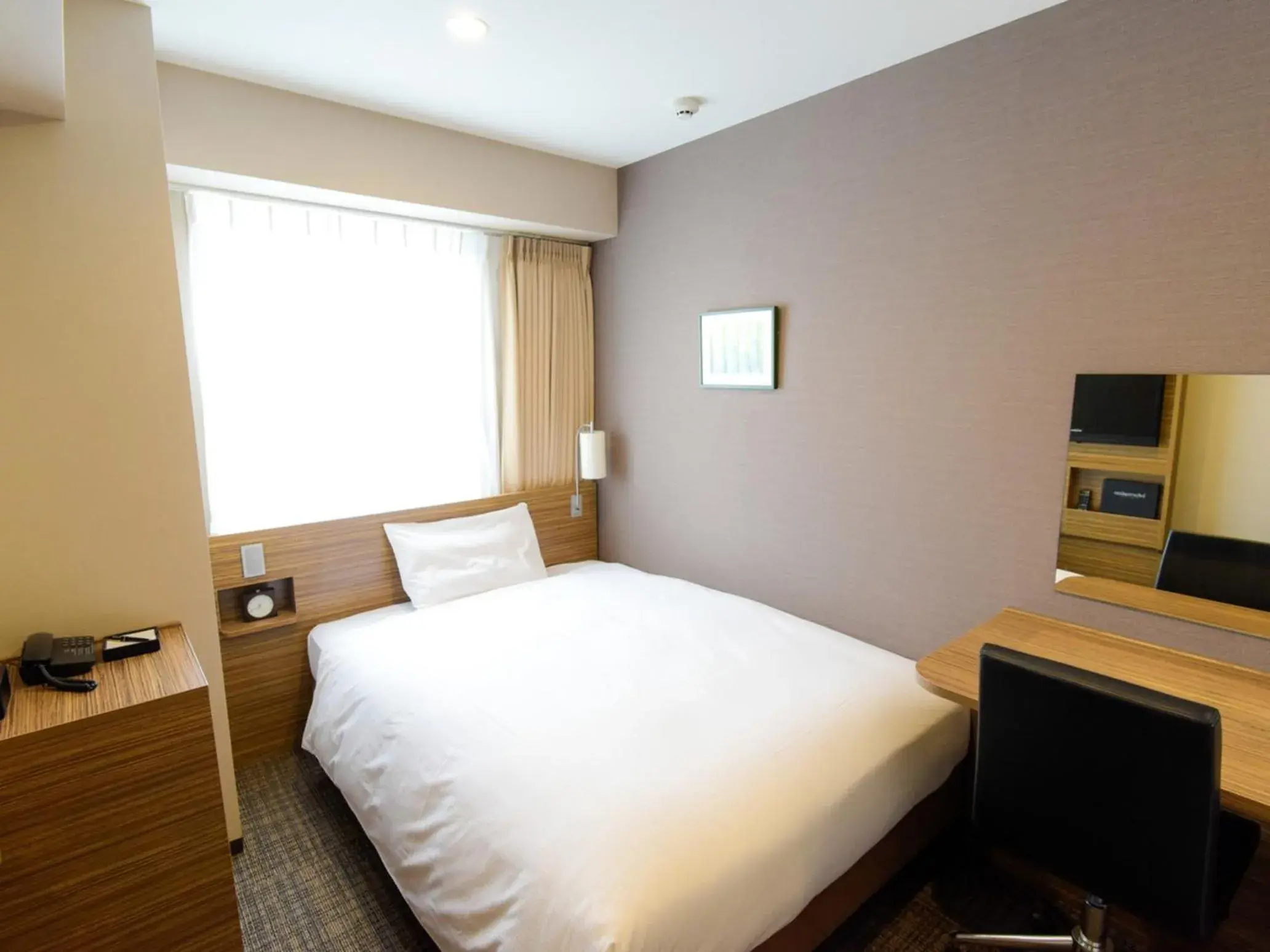 Bed in Via Inn Nagoya Shinkansen-guchi Bed in Via Inn Nagoya Shinkansen-guchi