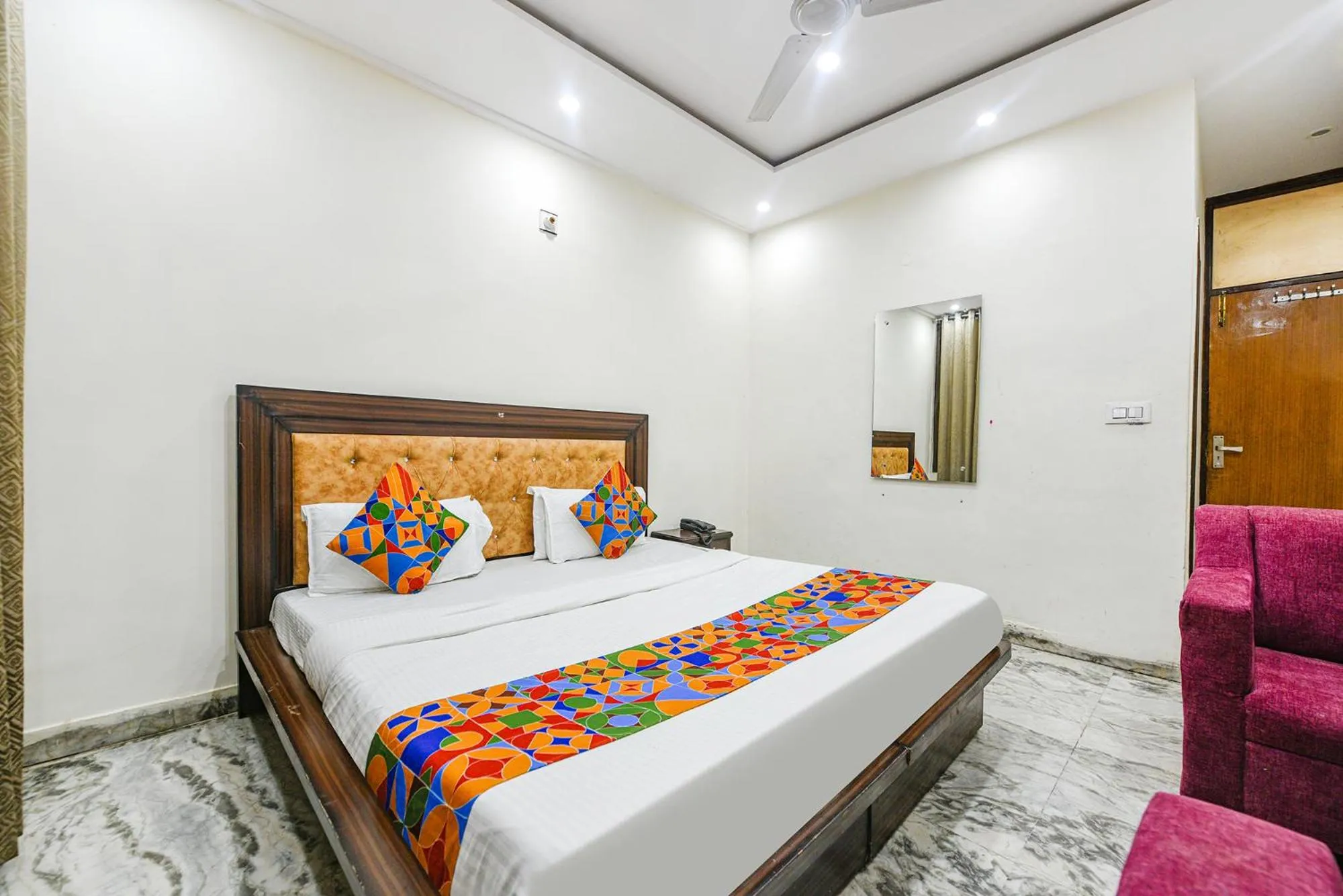 Bed in FabHotel Royal Inn