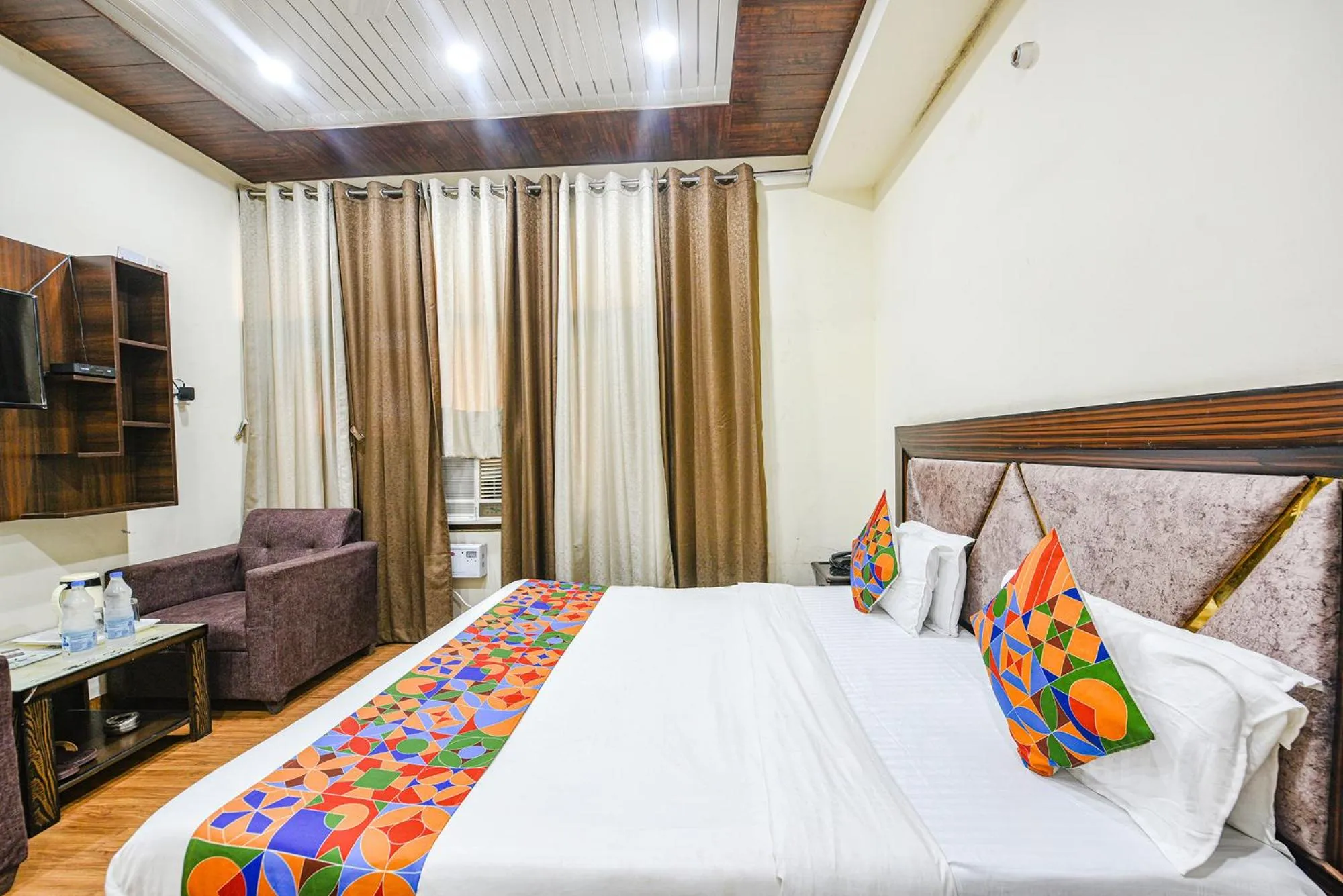 Bed in FabHotel Royal Inn