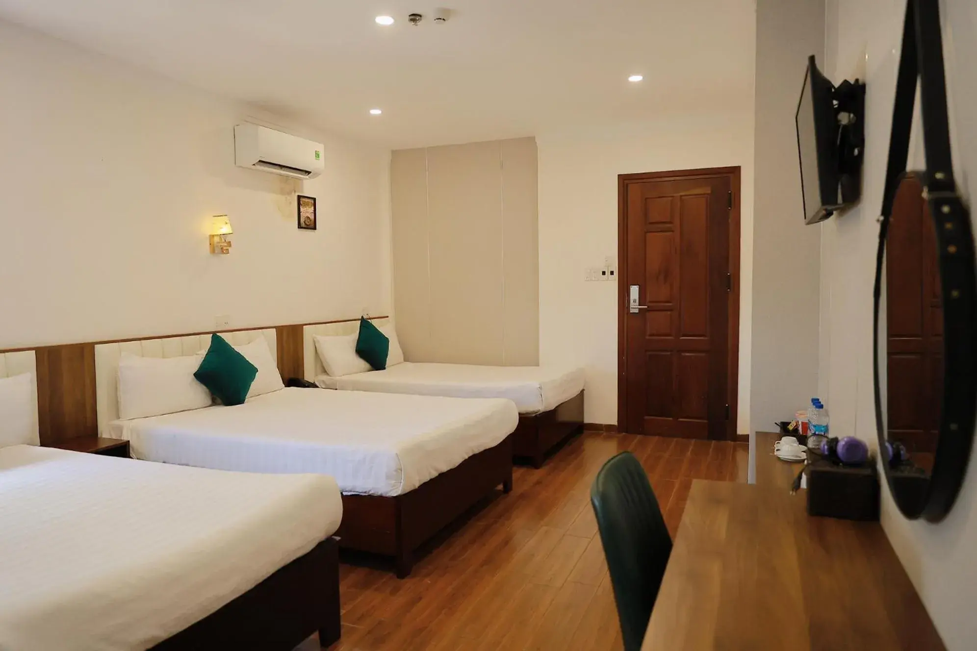 Deluxe Triple Room in Le Centre Pleiku Hotel Deluxe Triple Room in Le Centre Pleiku Hotel