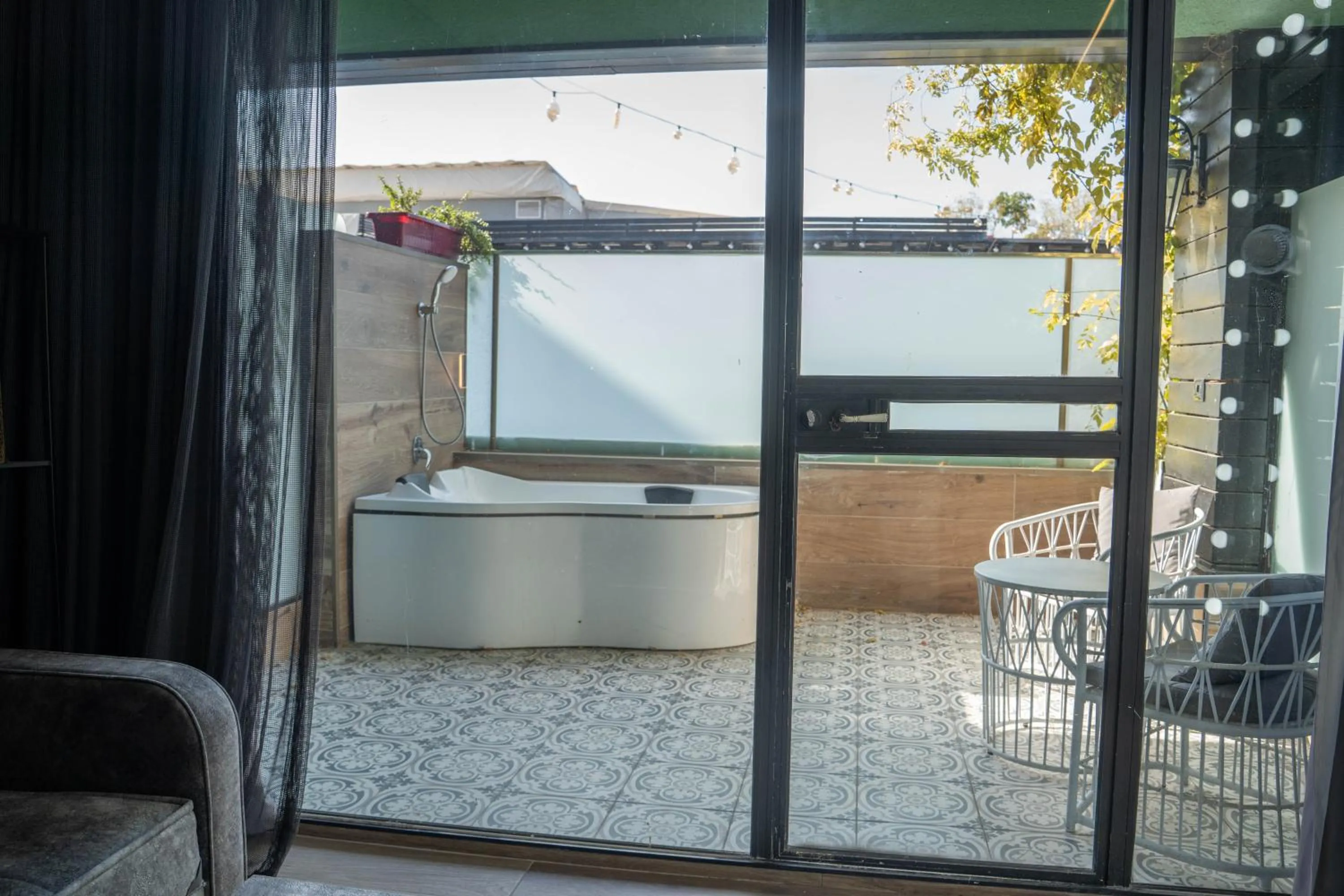 Patio in Garden Hotel Boutique & Events