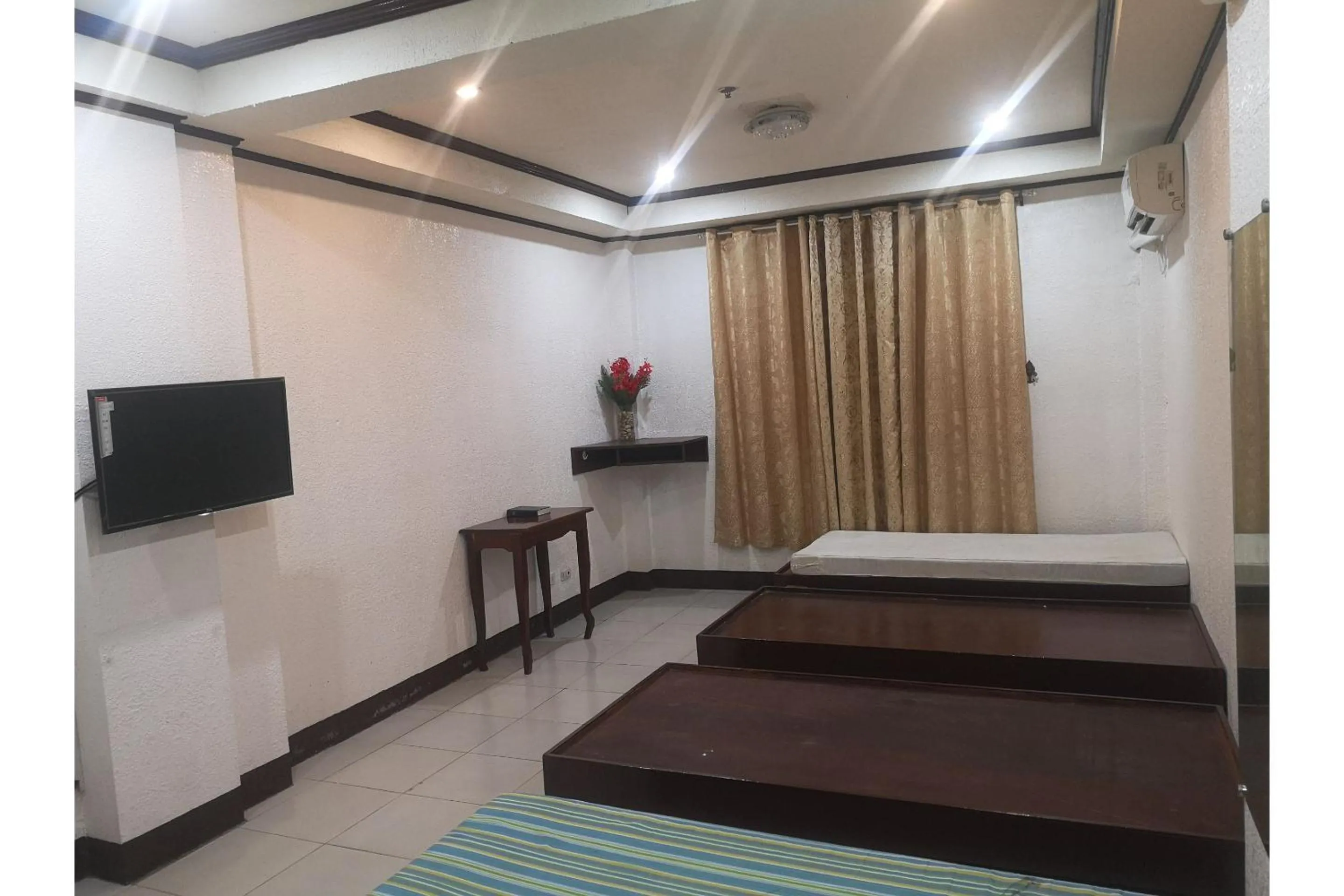 Bedroom in OYO 880 Flores De Musa Inn