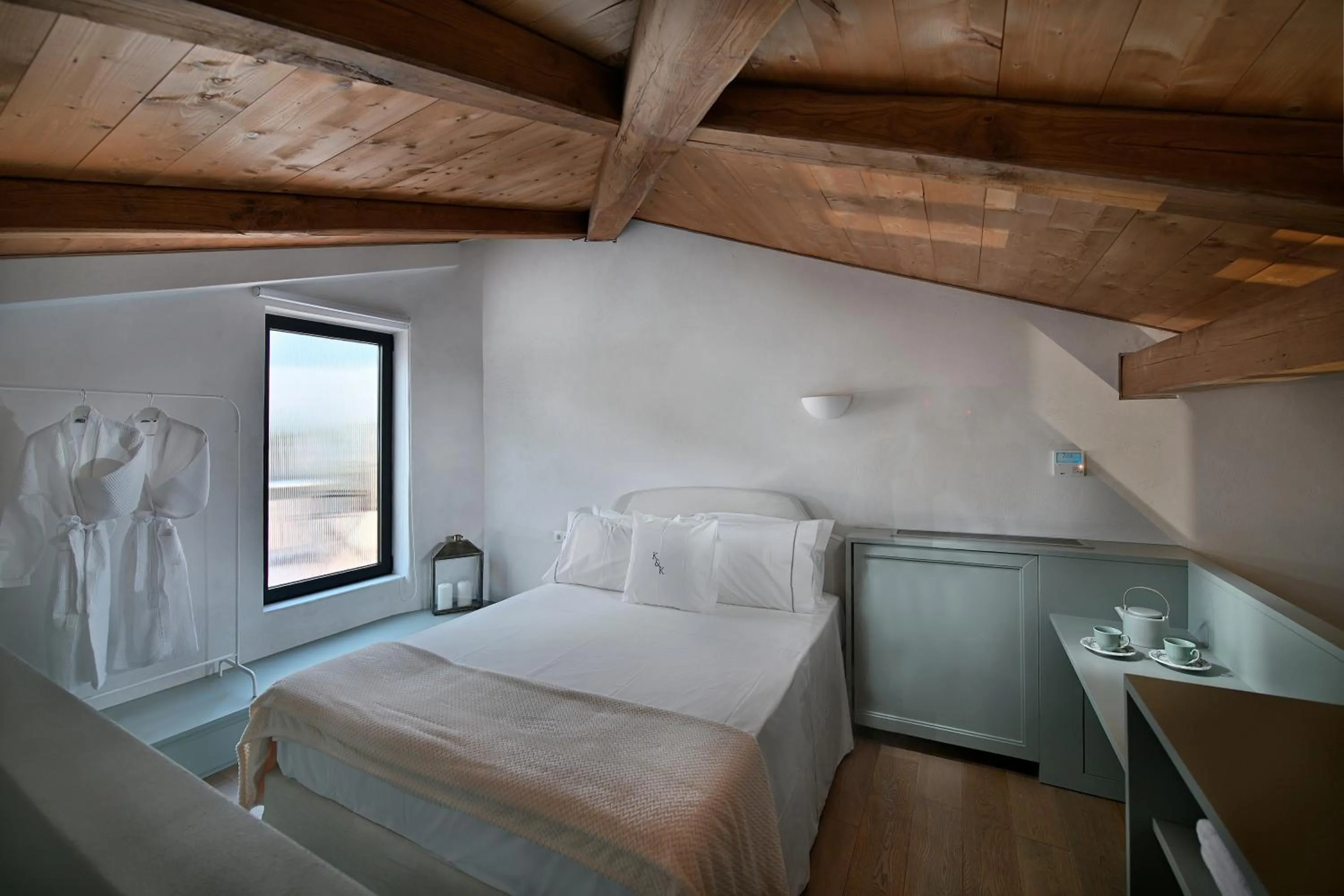 Photo of the whole room, Bed in ATHINAIDOS QUARTERS by K&K