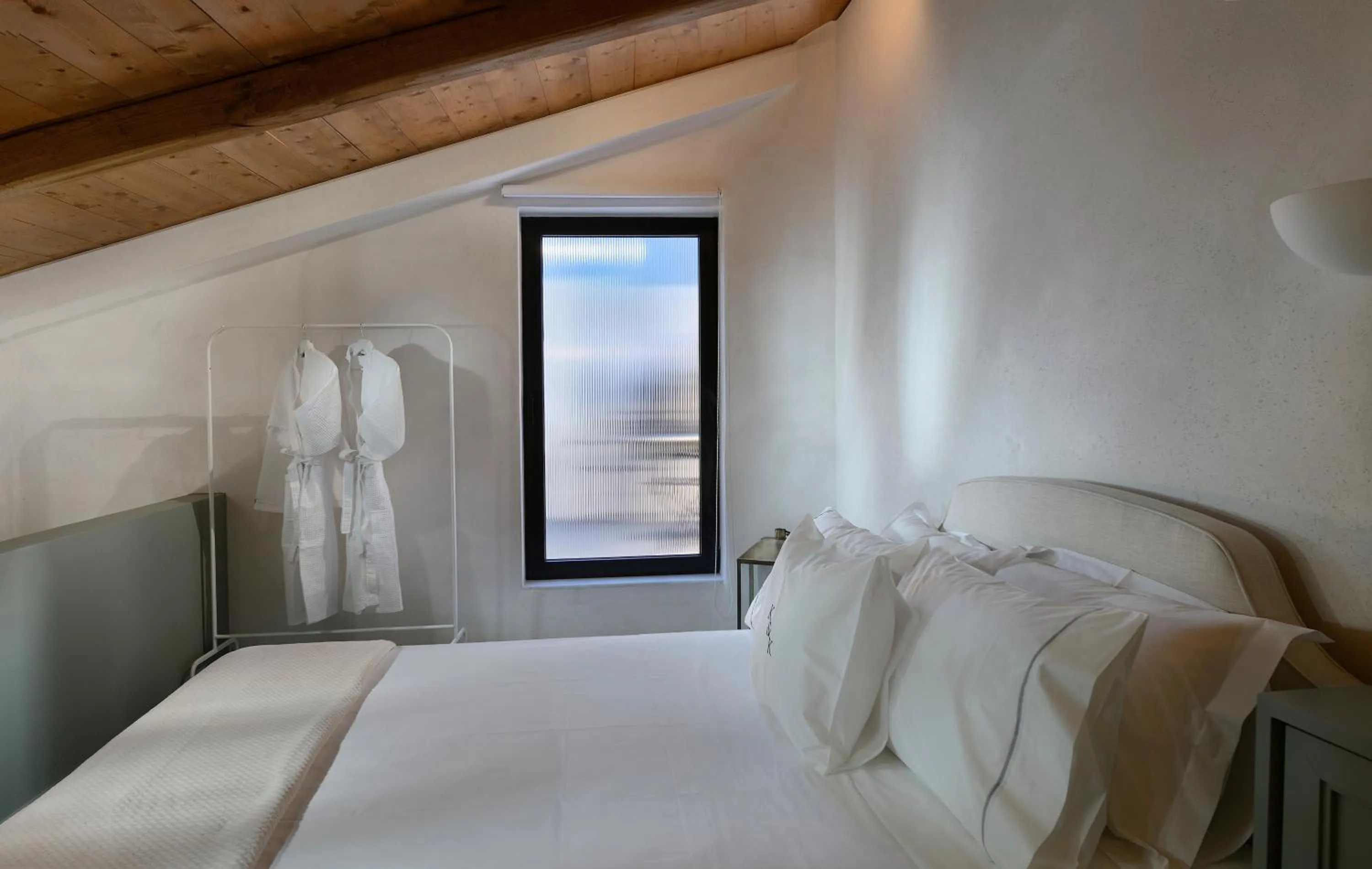 Photo of the whole room, Bed in ATHINAIDOS QUARTERS by K&K