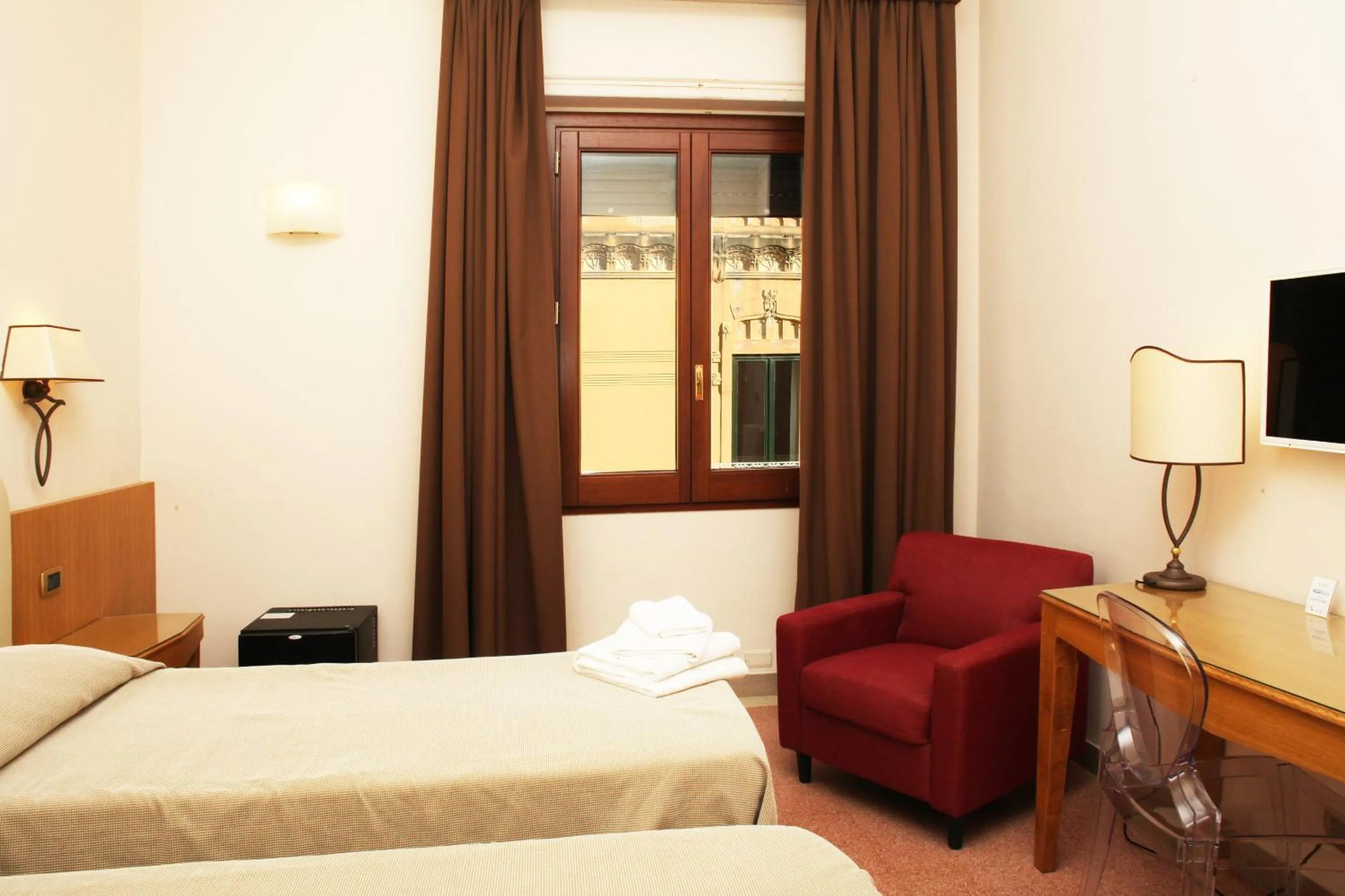 Photo of the whole room, Bed in Albergo Russo