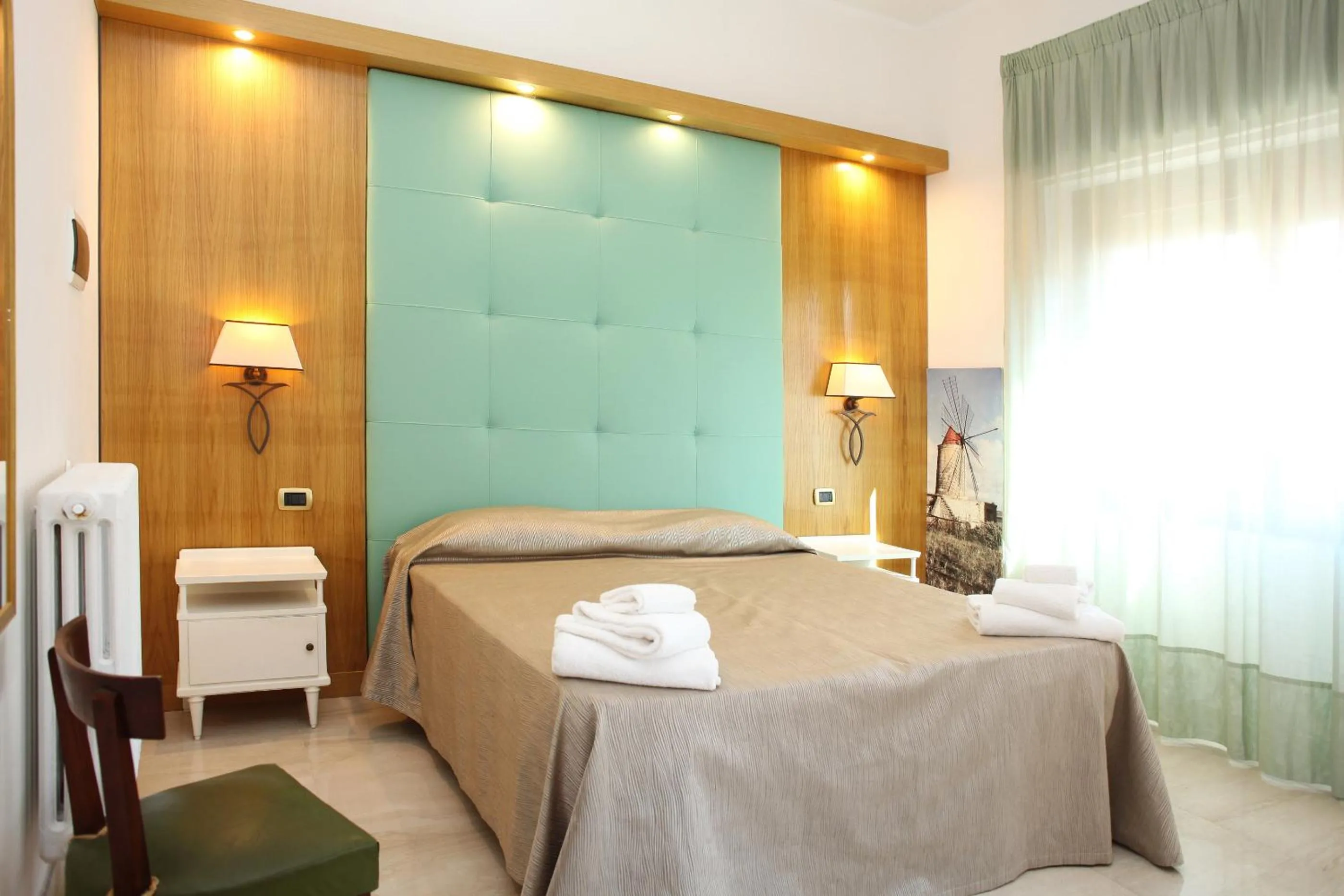 Photo of the whole room, Bed in Albergo Russo
