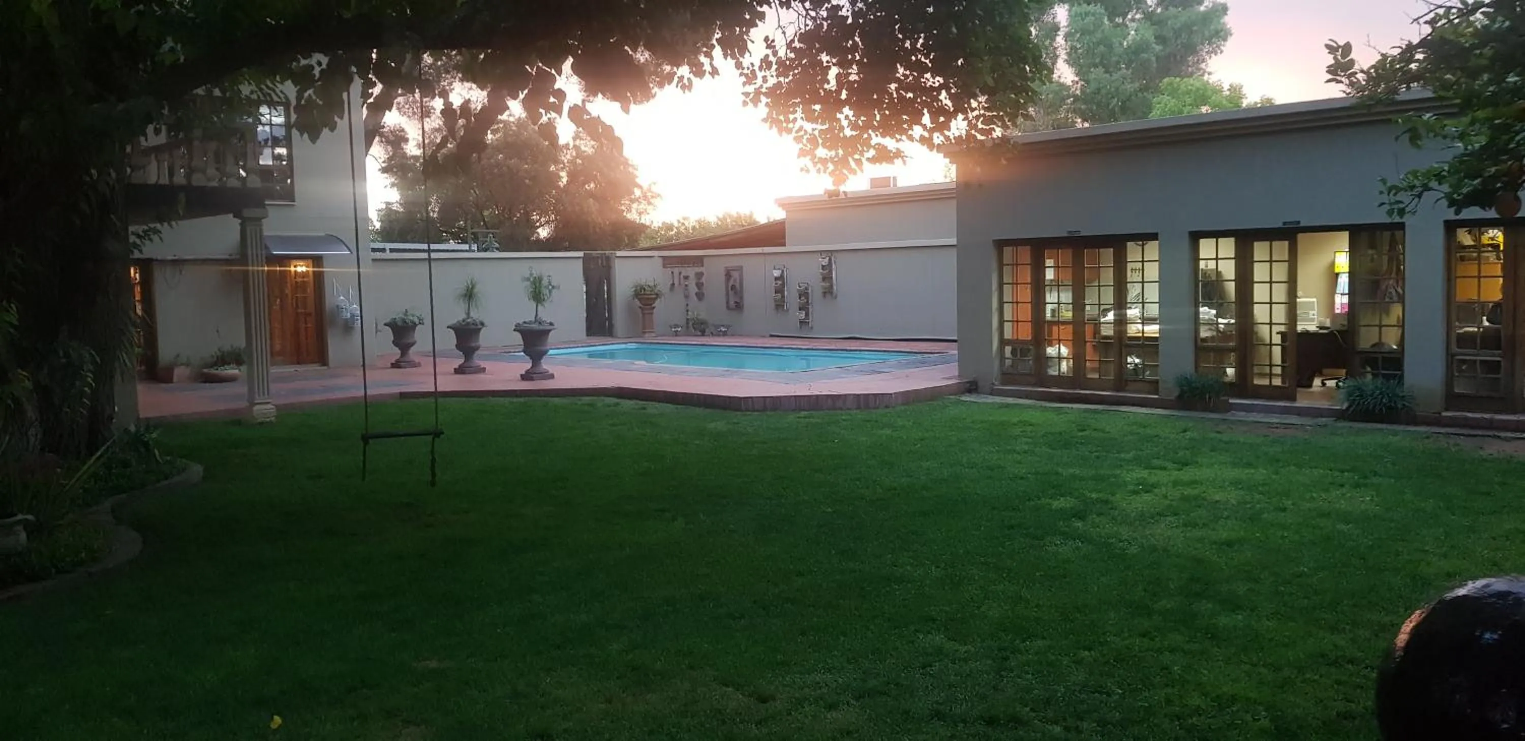 Swimming pool in De Stallen Guest Villas and Golf Course