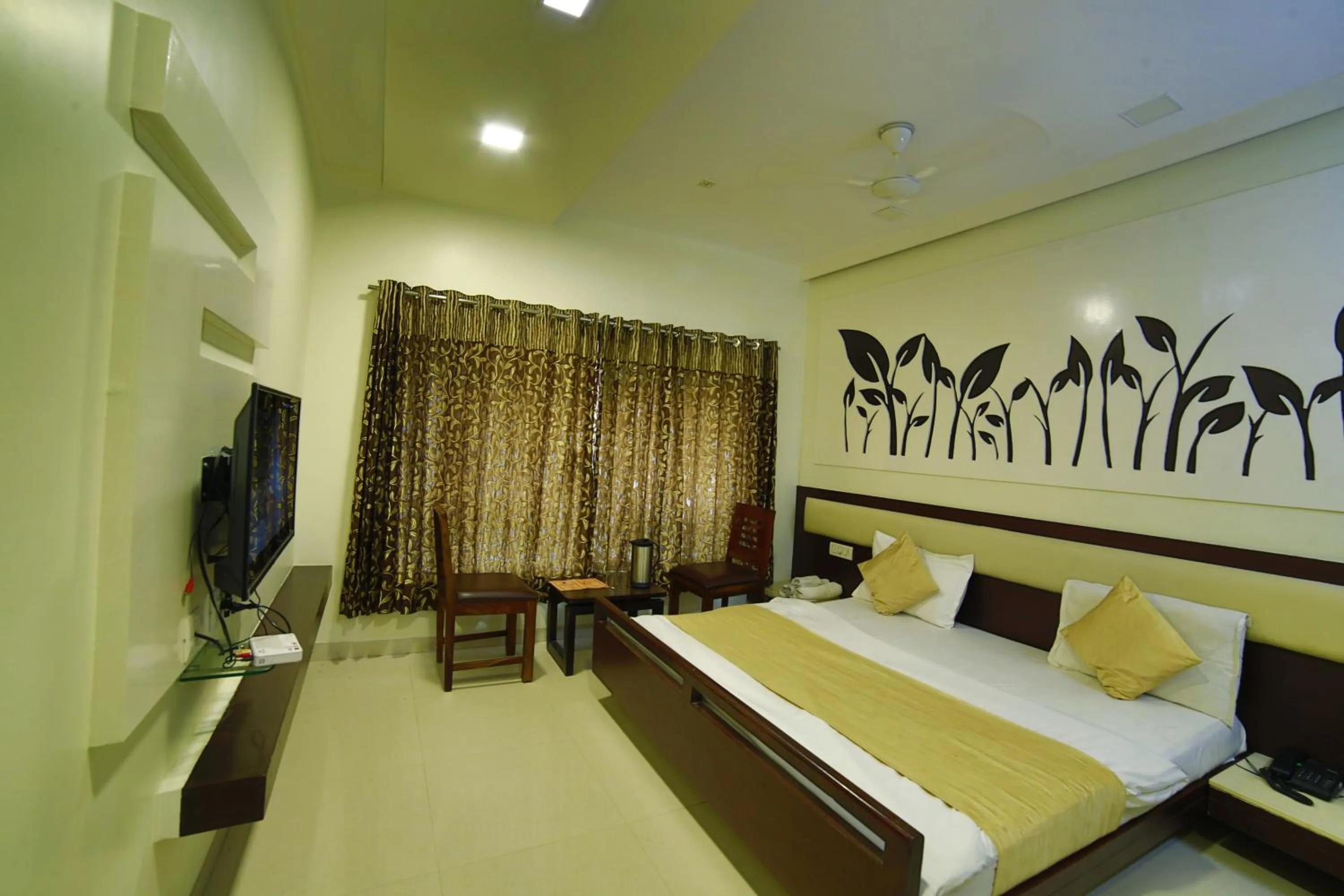 Photo of the whole room in Hotel Shiv Villa