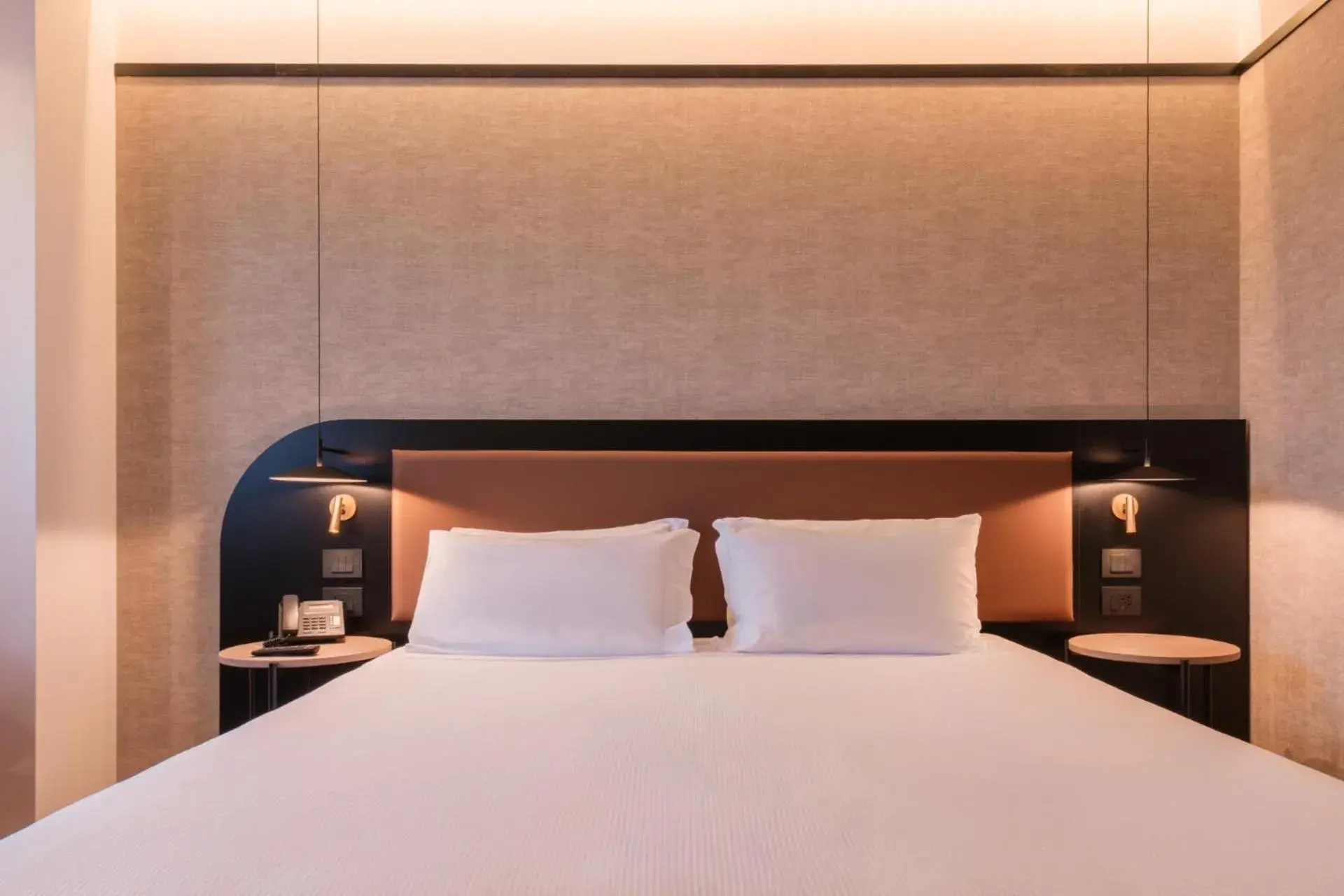 Bed in Savhotel Mantegna Padova Bed in Savhotel Mantegna Padova