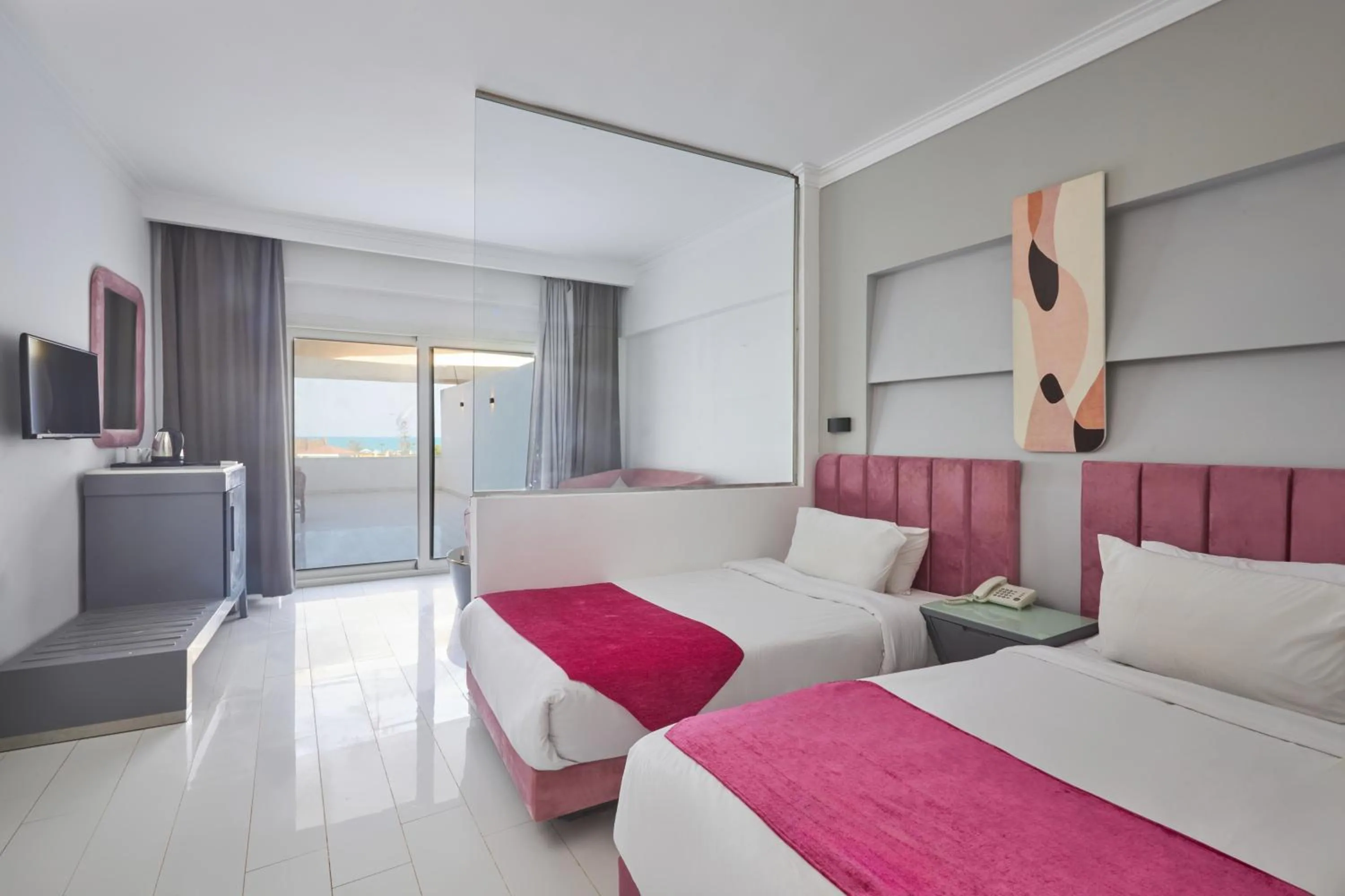 Bed in Golden Palace Marina Hotel