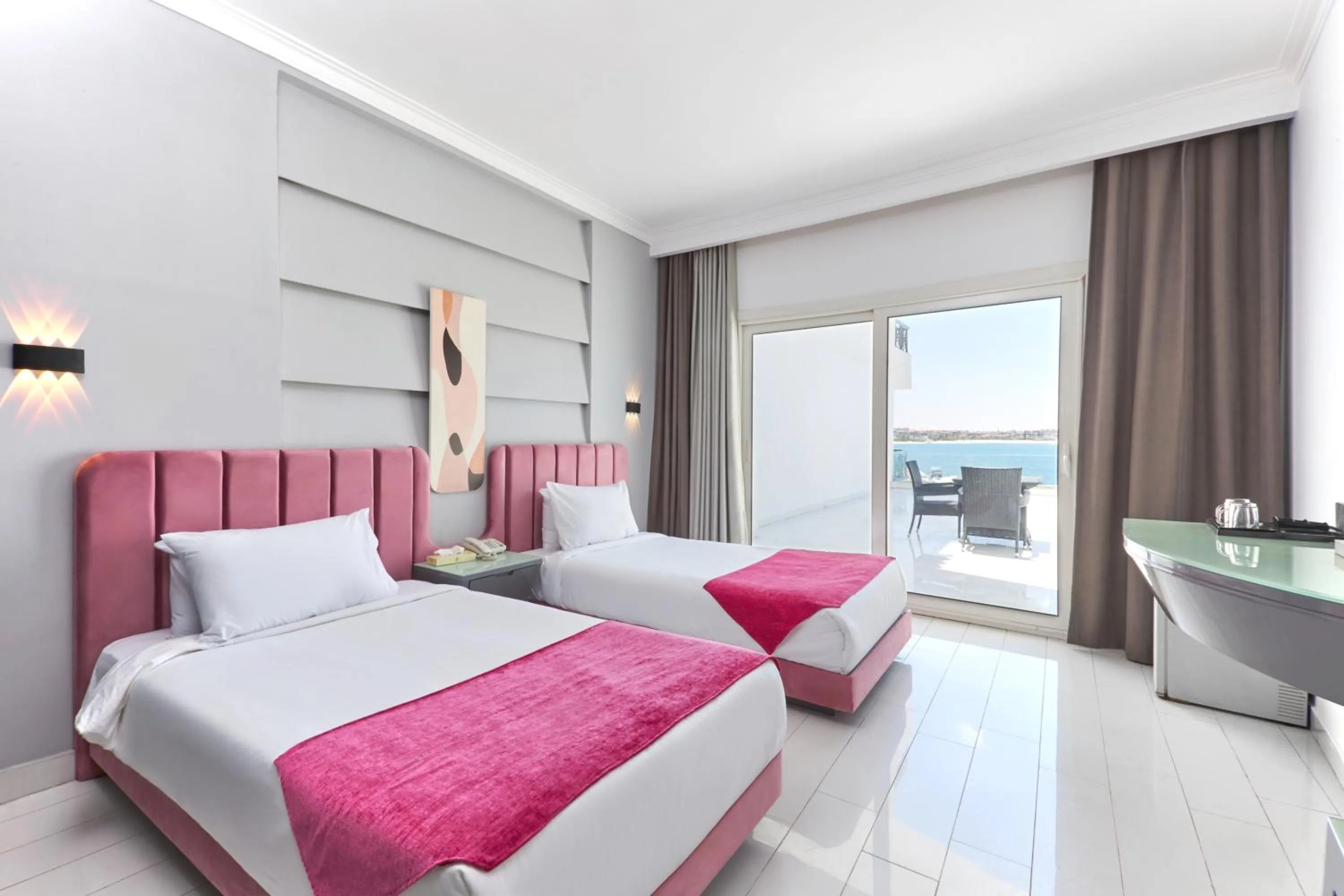 Bed in Golden Palace Marina Hotel